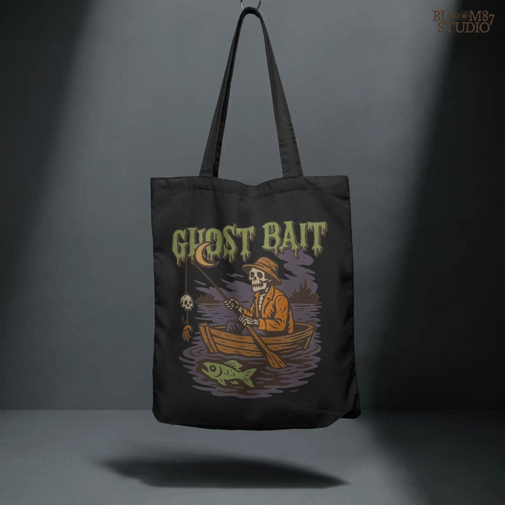 Funny Halloween PNG design of a skeleton fisherman in a wooden boat with a skull as bait and a ghostly fish, titled “Ghost Bait”.