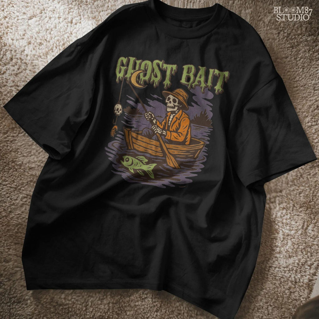Funny Halloween PNG design of a skeleton fisherman in a wooden boat with a skull as bait and a ghostly fish, titled “Ghost Bait”.