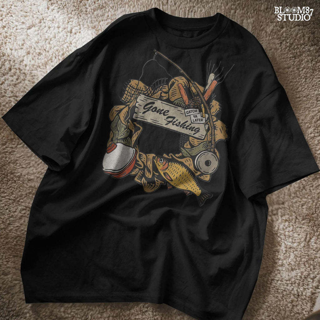 Rustic “Gone Fishing” wreath PNG design featuring bobber, fishing gear, reeds, yellow fish, and a wooden sign, perfect for sublimation on shirts and decor.