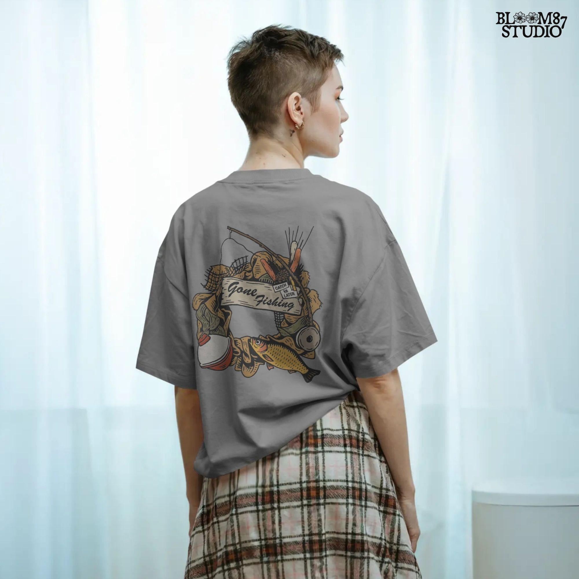 Rustic “Gone Fishing” wreath PNG design featuring bobber, fishing gear, reeds, yellow fish, and a wooden sign, perfect for sublimation on shirts and decor.