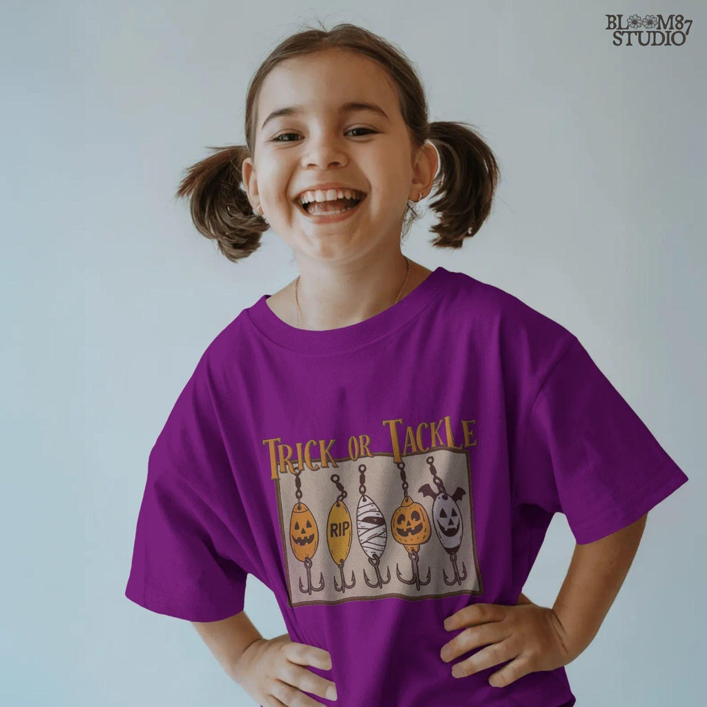 Funny Halloween sublimation PNG with five fishing lures designed as spooky characters: jack-o’-lanterns, tombstone, mummy, ghost, and bat, under “Trick or Tackle” text.