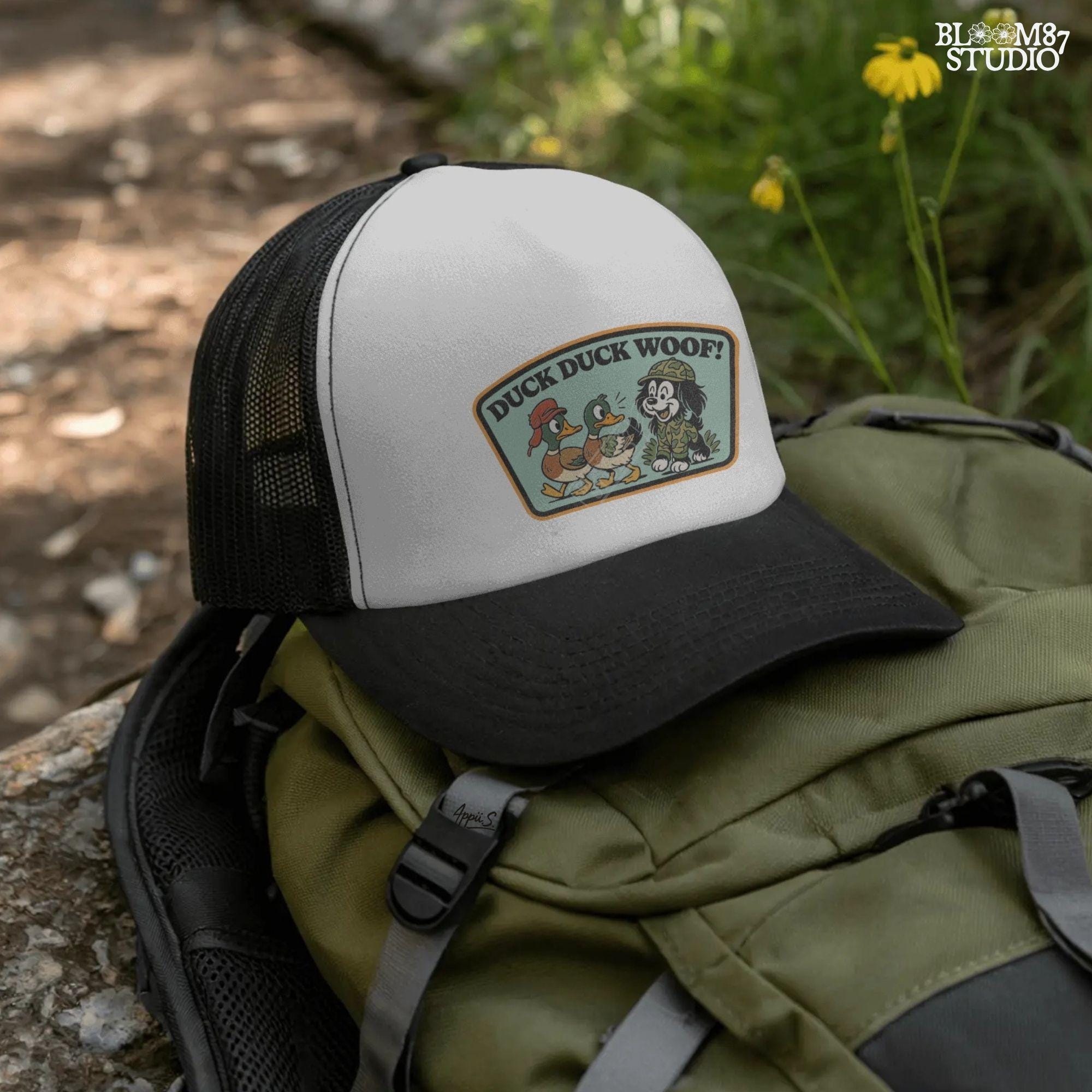 Cartoon hunting dog in camo outfit (front design) and back scene with ducks and the same dog with “Duck Duck Woof!” text – cute front and back PNG set for kids.