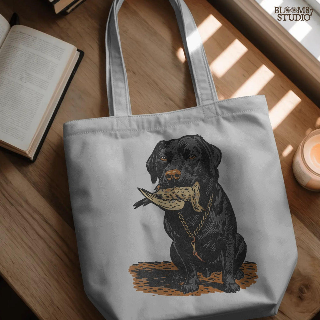 Black Labrador retriever sitting with a dove in its mouth, illustrated for dove hunting sublimation projects and bird dog gift designs.