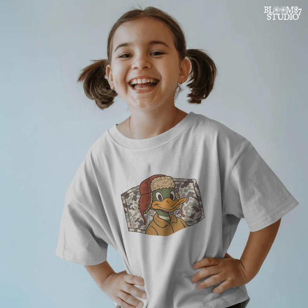 Cartoon duck in a trapper hat and camo jacket, kid-friendly hunting design with autumn theme, suitable for back to school sublimation.
