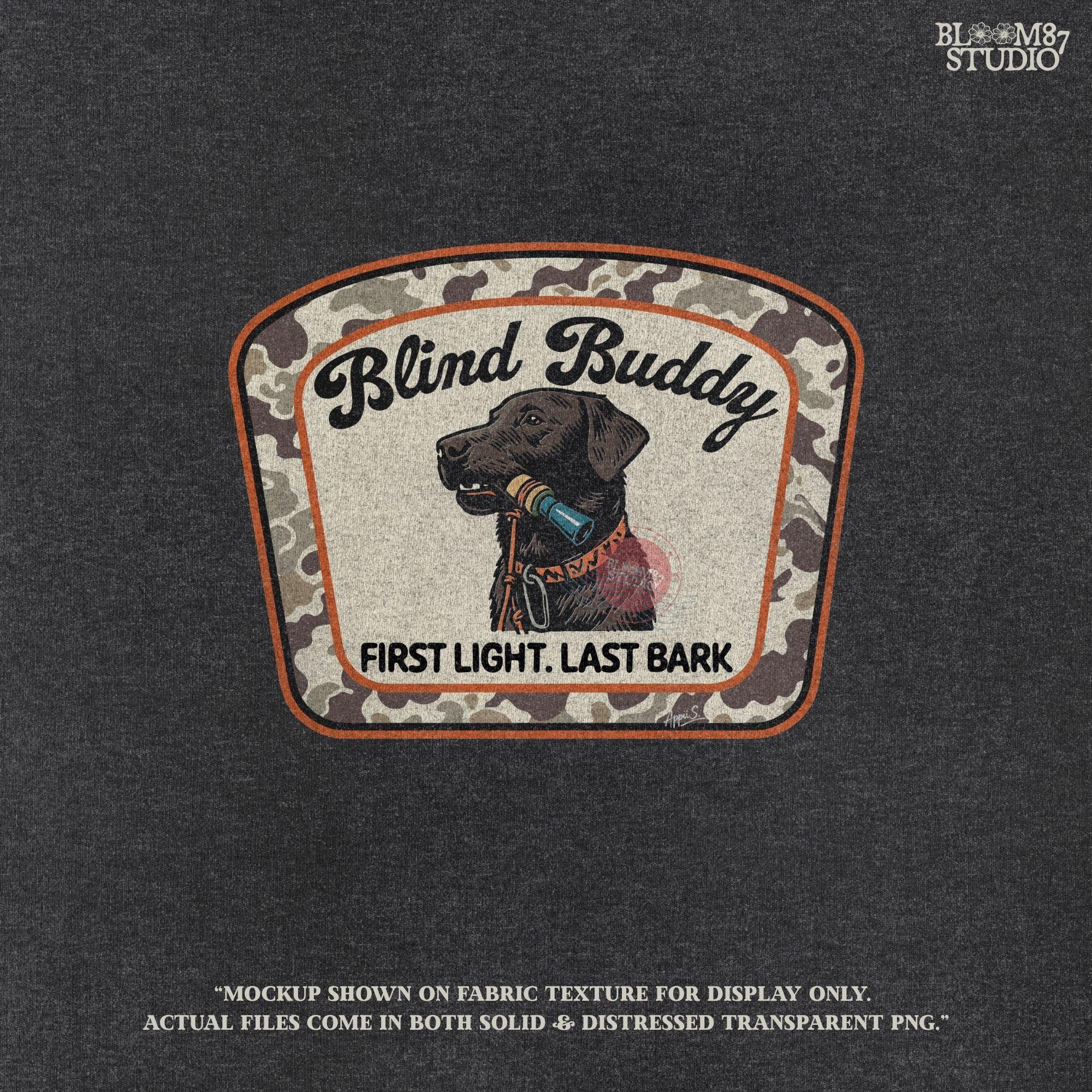 Black labrador dog holding a duck call in its mouth, centered in a camouflage hunting patch with text “Blind Buddy – First Light. Last Bark”
