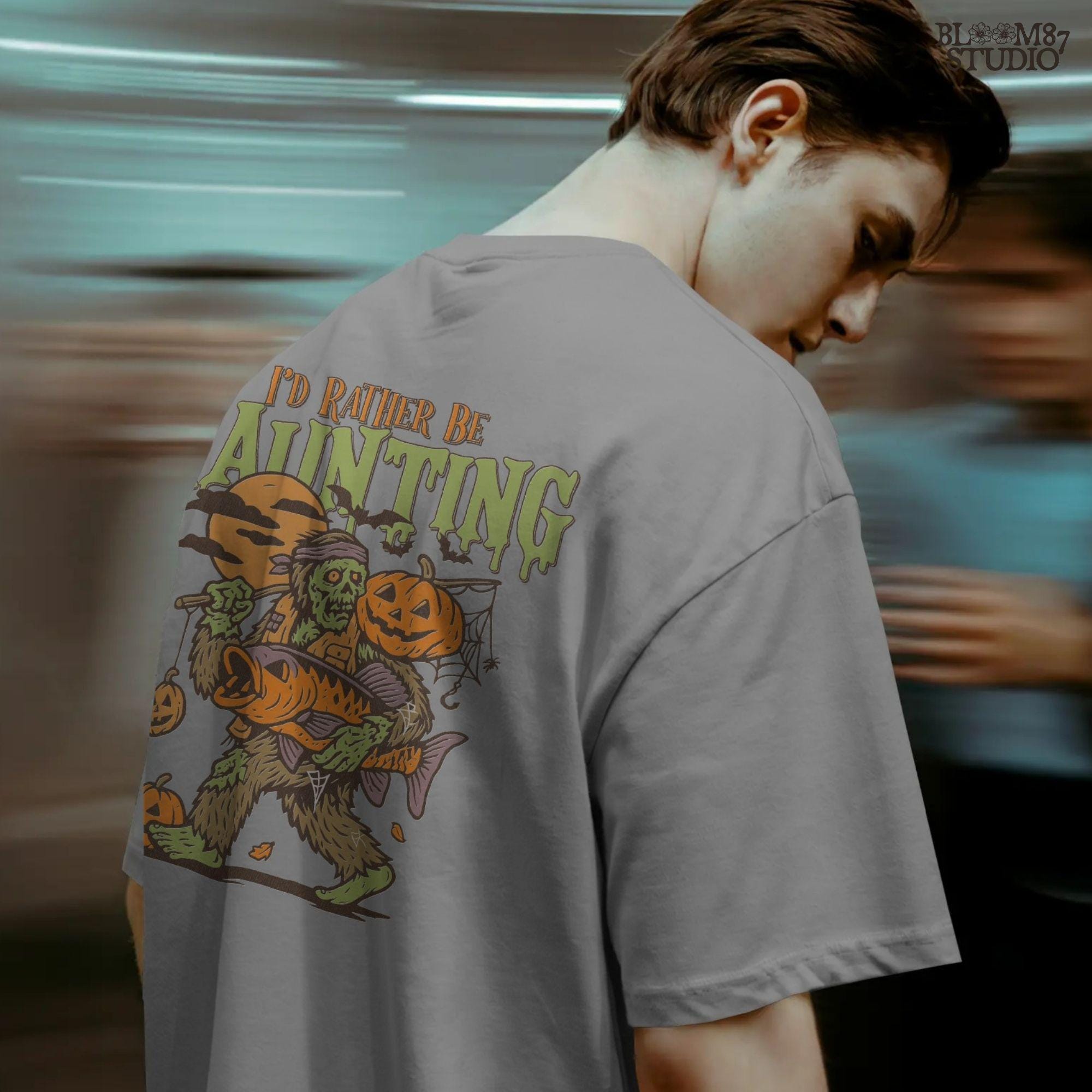 Zombie fisherman walking with a giant bass fish and jack-o’-lanterns, surrounded by bats and full moon, Halloween-themed sublimation clipart.