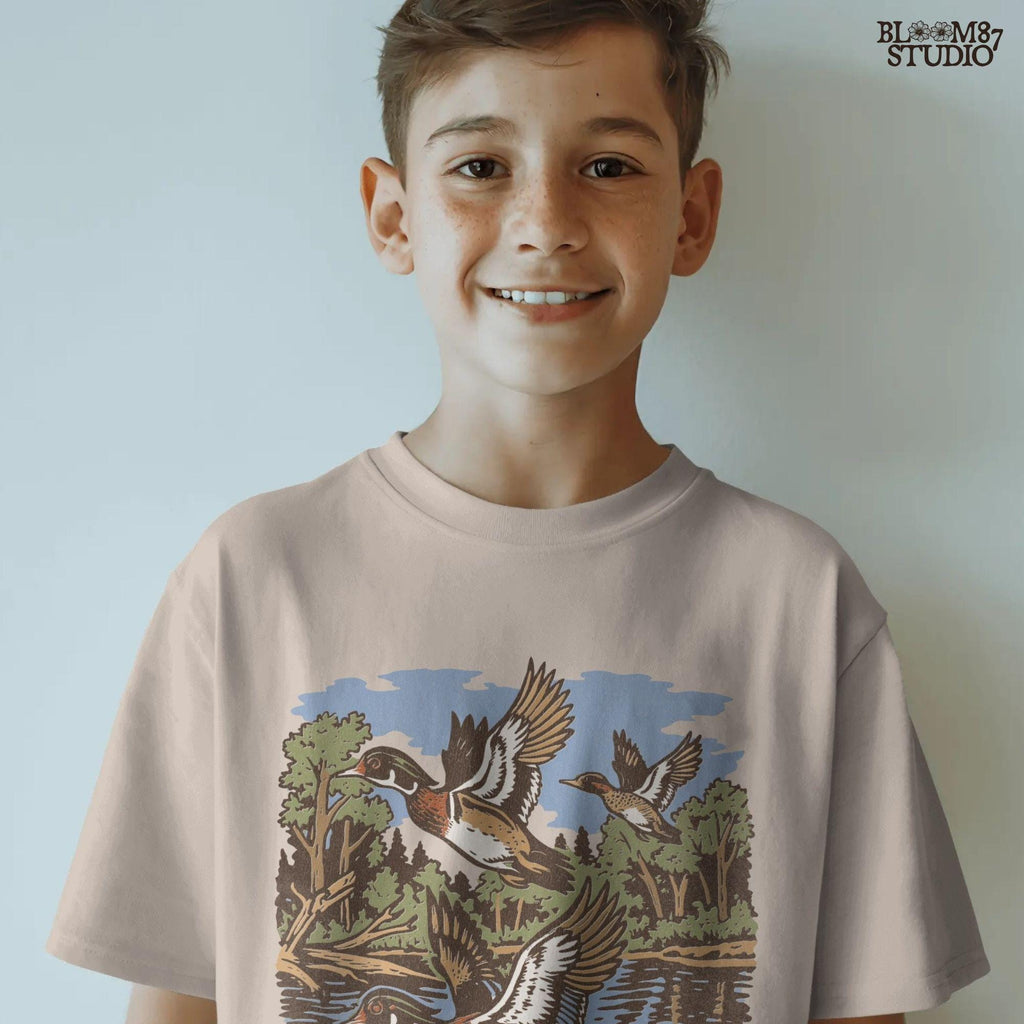 Vintage wood duck artwork showing ducks flying over a calm forest lake, perfect for fall hunting-themed sublimation designs and rustic crafts.