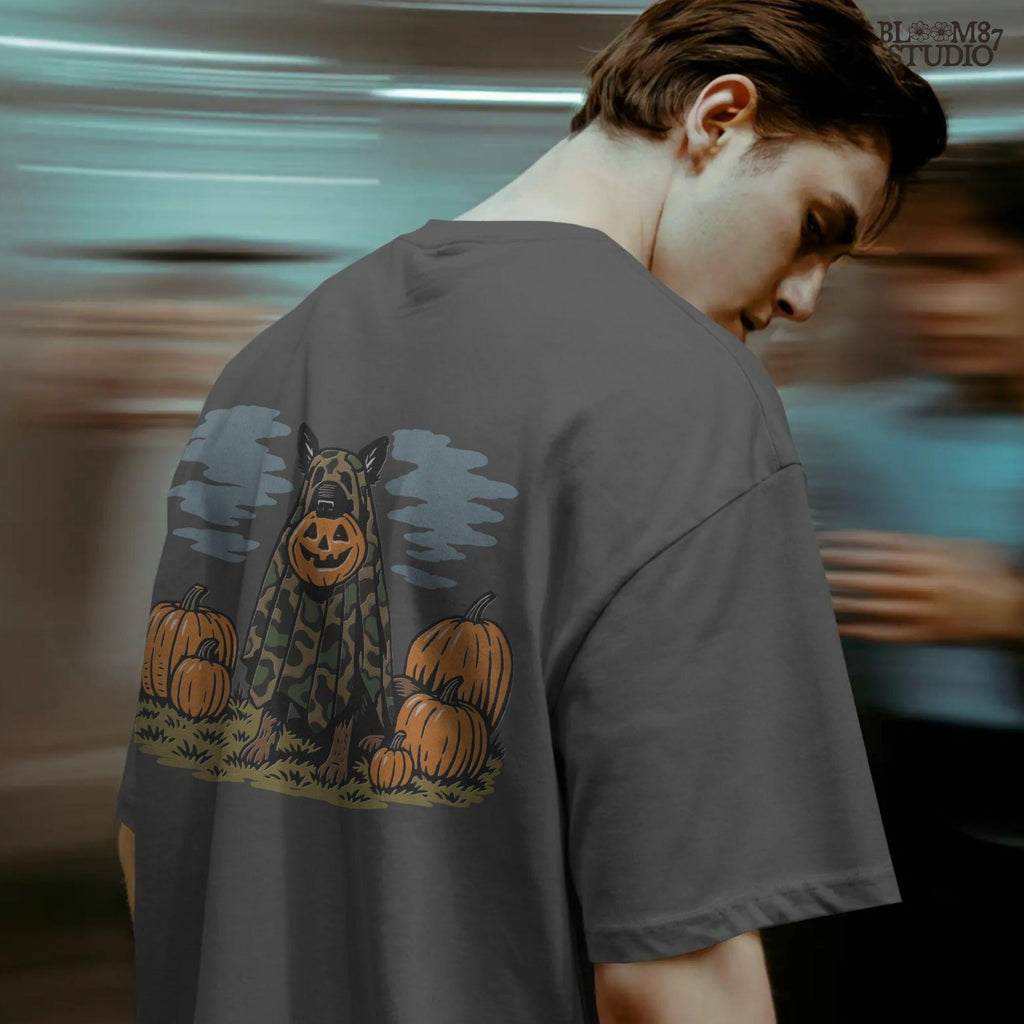 German Shepherd in camouflage ghost costume with jack-o’-lantern head surrounded by pumpkins, Halloween-themed sublimation design