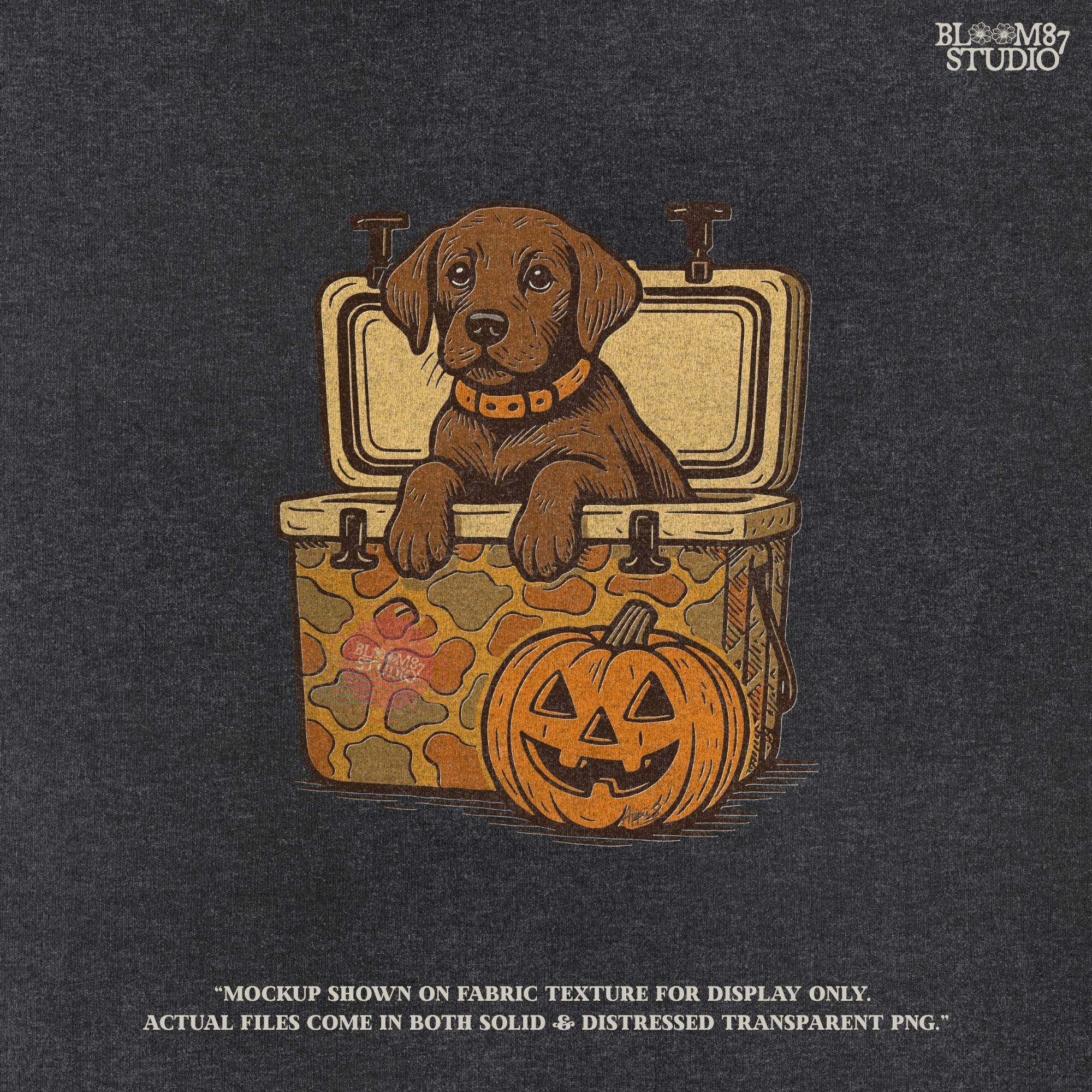 Cute brown hunting dog in a camo cooler next to a carved pumpkin, Halloween-themed sublimation PNG for fall shirts or seasonal crafts.