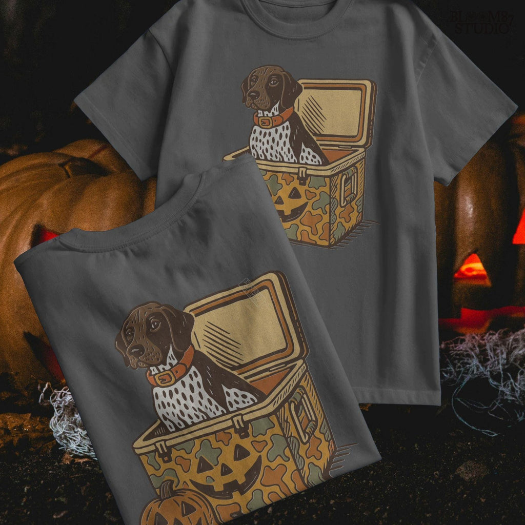German Shorthair Pointer dog sitting inside a camo cooler with Jack O’ Lantern carvings, Halloween-themed sublimation PNG for fall shirts.