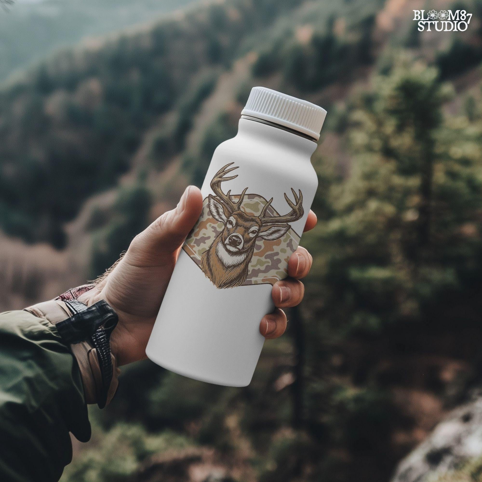 Illustration of a whitetail buck head over a soft-tone woodland camouflage background, designed for fall-themed sublimation and hunting crafts.