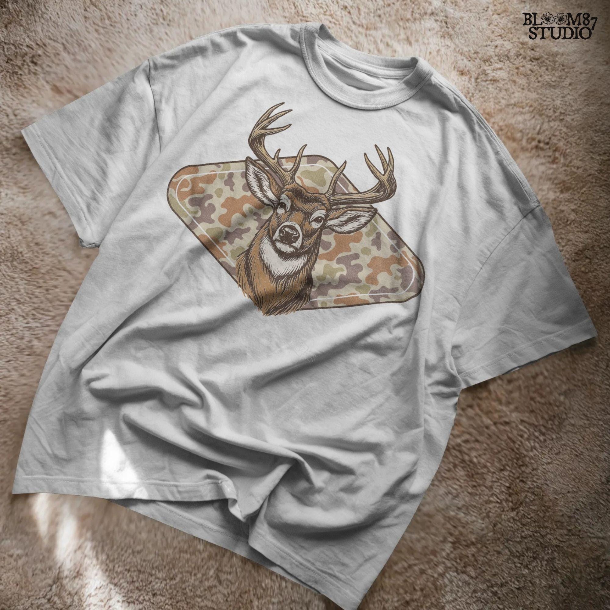 Illustration of a whitetail buck head over a soft-tone woodland camouflage background, designed for fall-themed sublimation and hunting crafts.
