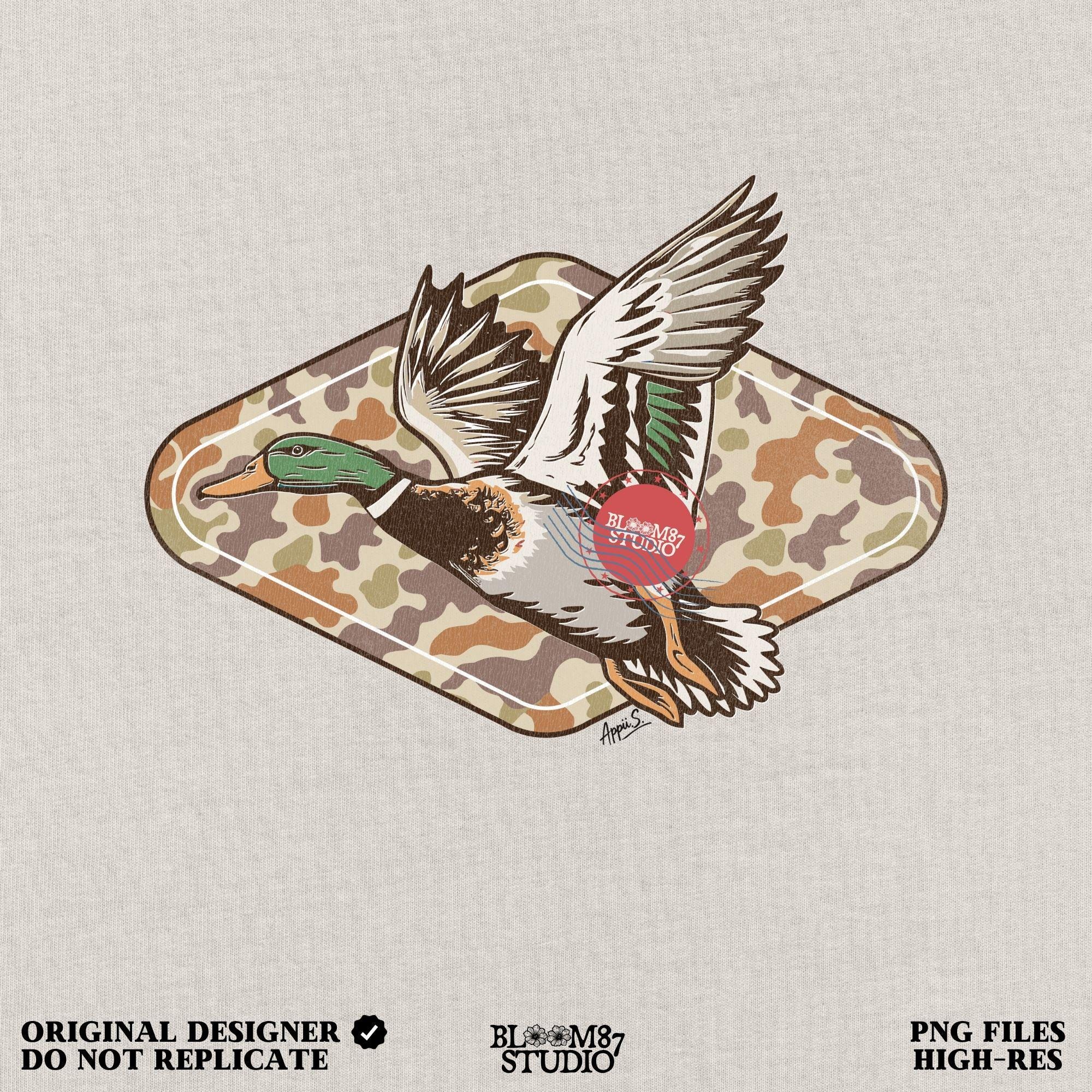 Mallard duck flying over a tan and brown woodland camo background, stylized for fall hunting and Thanksgiving sublimation projects.