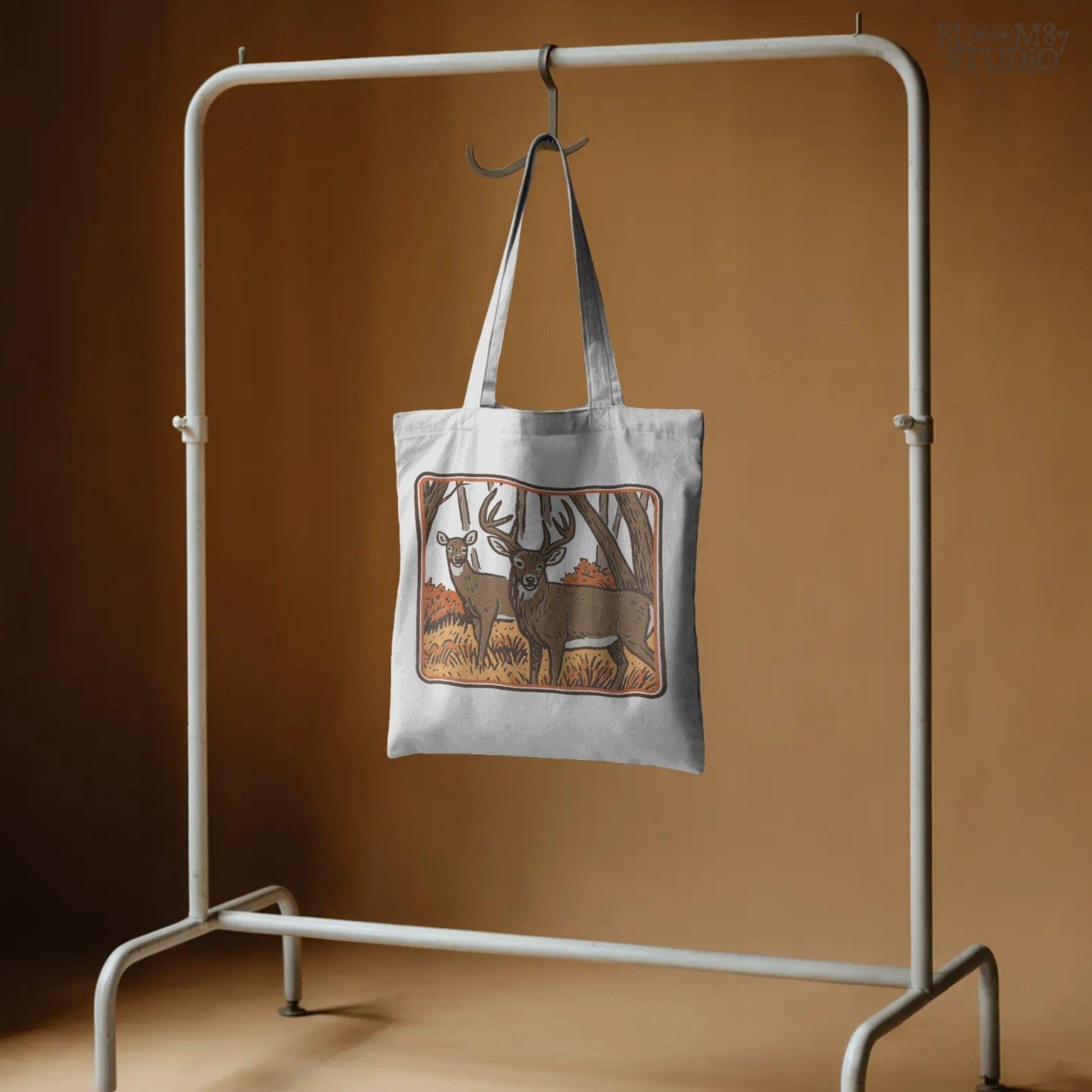 Whitetail buck and doe standing in an autumn forest with orange foliage, fall hunting scene sublimation design