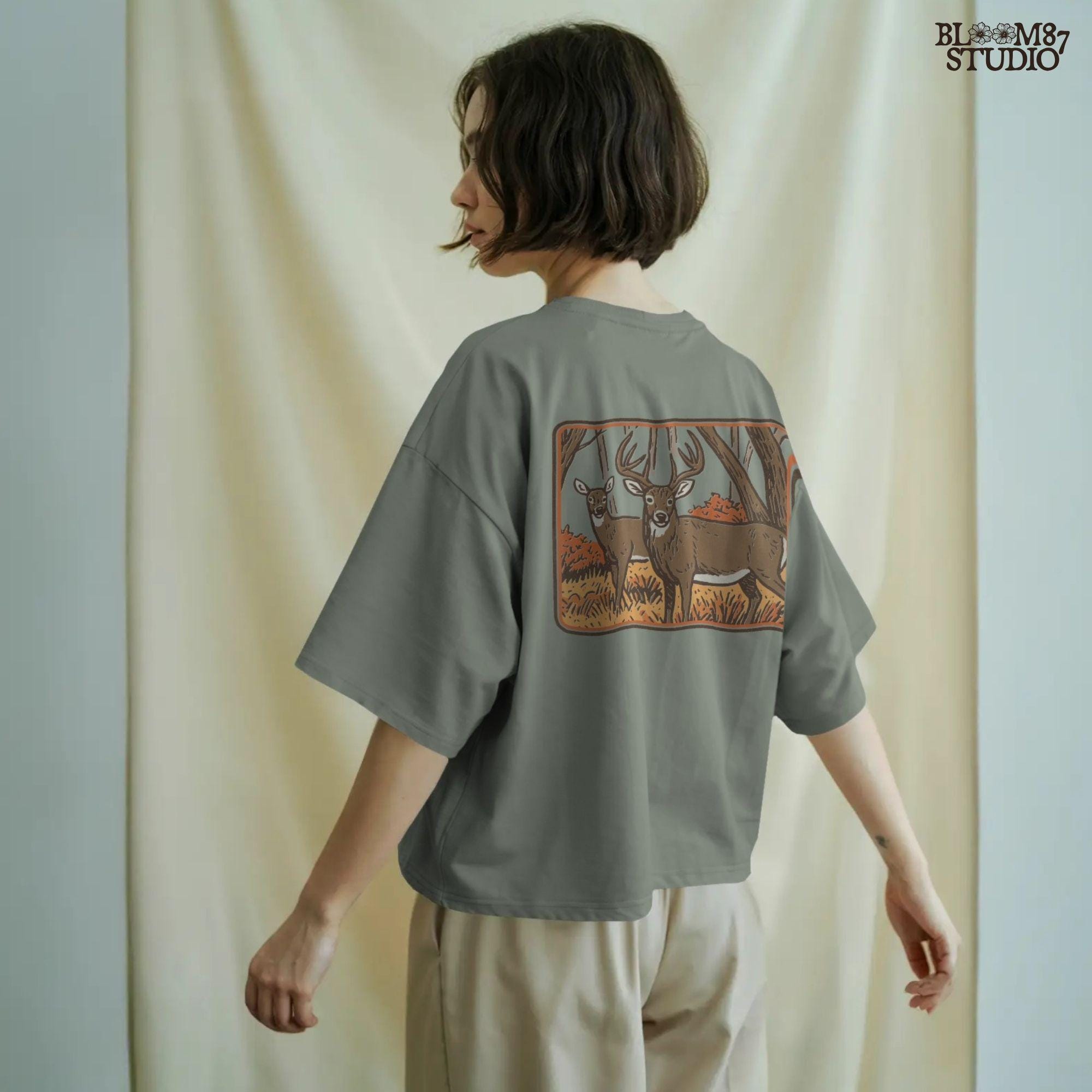 Whitetail buck and doe standing in an autumn forest with orange foliage, fall hunting scene sublimation design