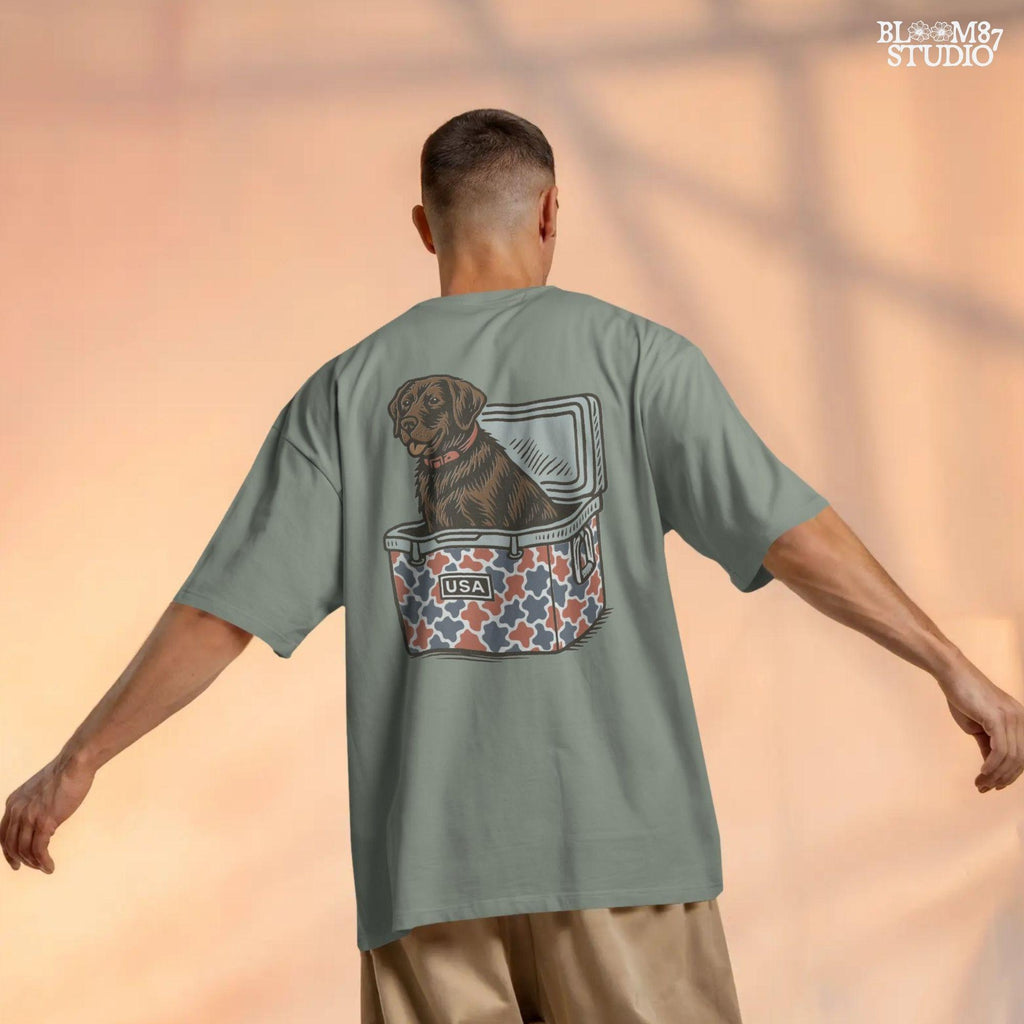 Patriotic sublimation PNG of a brown Labrador sitting inside a red, white, and blue USA-themed cooler, perfect for July 4th crafts and shirts