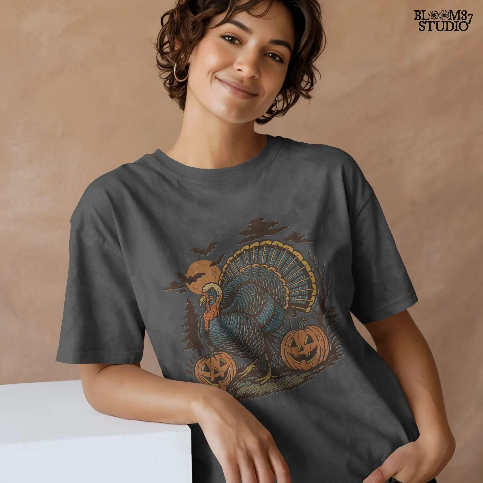 Funny sublimation PNG of a turkey surrounded by jack-o’-lanterns, bats, and a spooky full moon, perfect for Halloween and Thanksgiving crafts