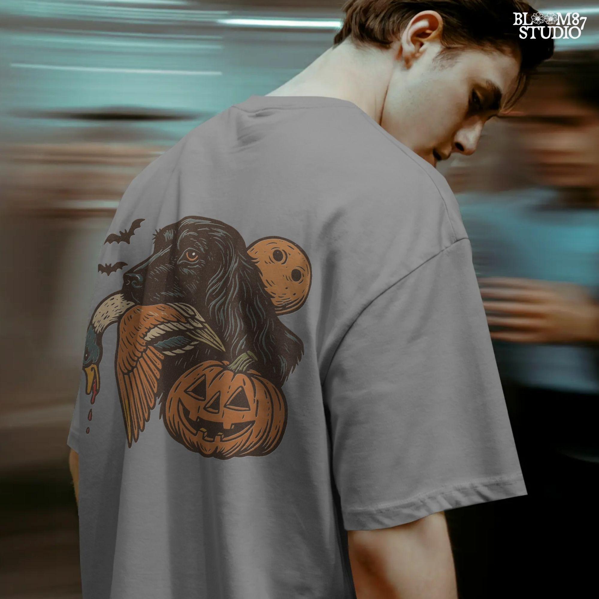 Halloween PNG of a black hunting dog holding a duck with jack-o’-lanterns, bats, and a full moon, rustic sublimation for fall crafts