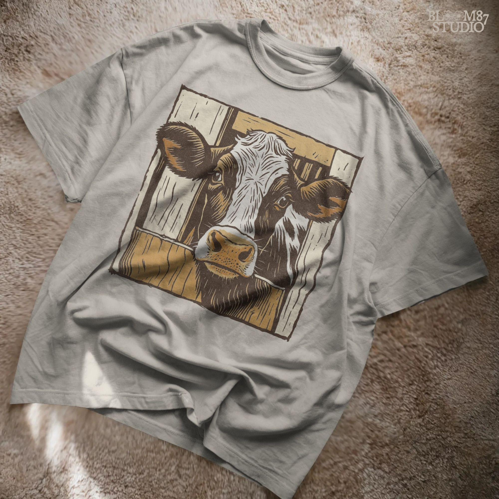 Illustration of a black-and-white dairy cow peeking through a rustic wooden barn door, farmhouse-style sublimation PNG design