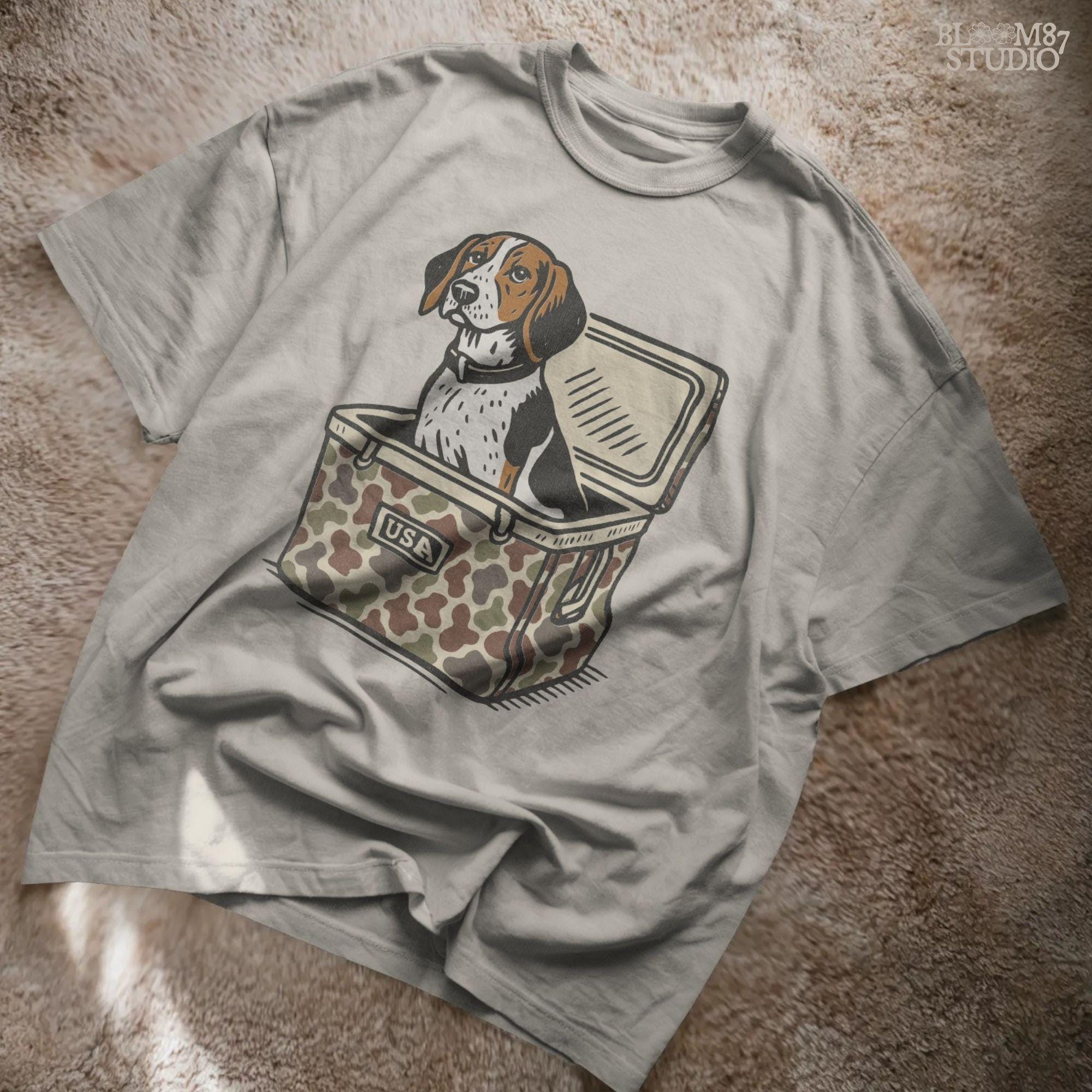 Illustration of a Treeing Walker Coonhound sitting in a camo-patterned cooler with USA label, digital PNG for hunting and farmhouse crafts