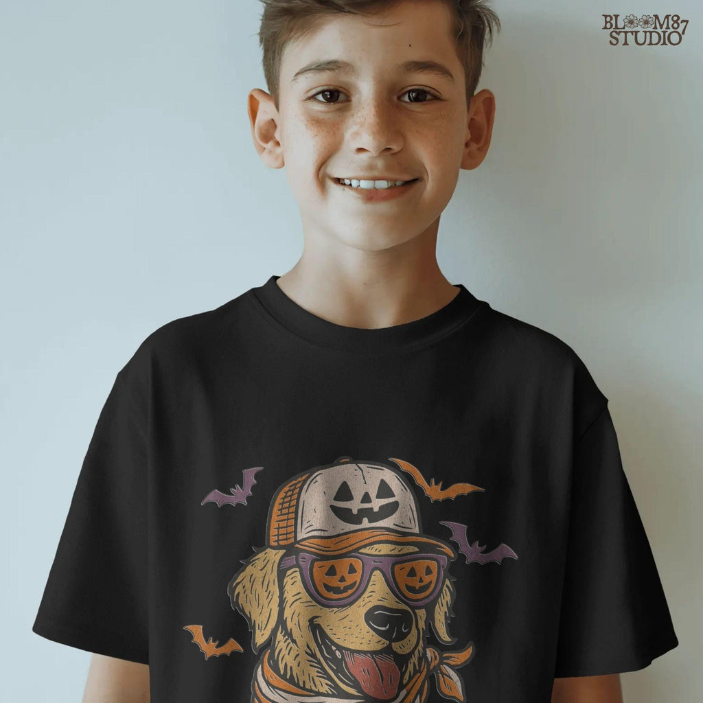 Golden retriever wearing jack-o’-lantern sunglasses, pumpkin hat, and orange bandana, surrounded by bats, Halloween-themed sublimation PNG