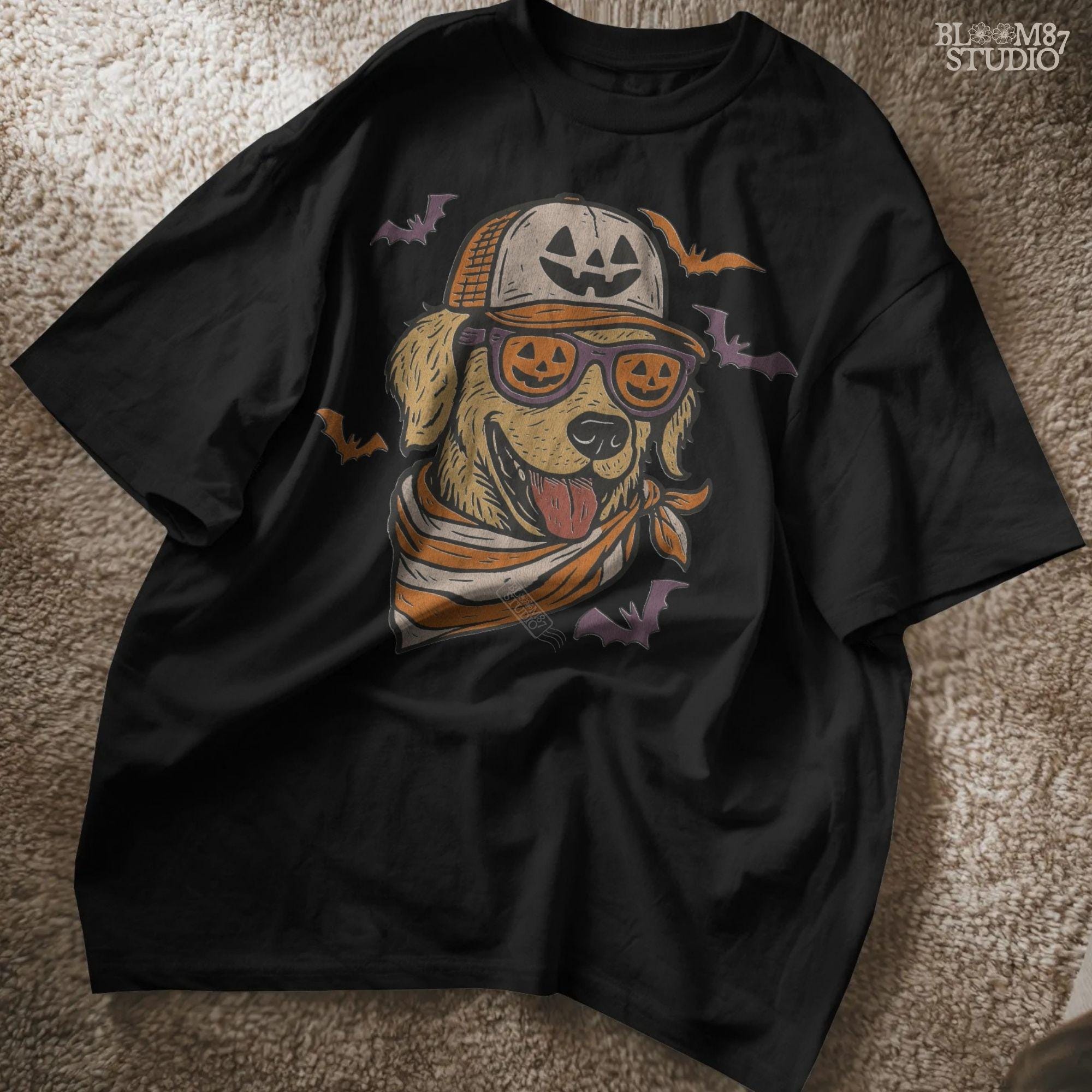 Golden retriever wearing jack-o’-lantern sunglasses, pumpkin hat, and orange bandana, surrounded by bats, Halloween-themed sublimation PNG