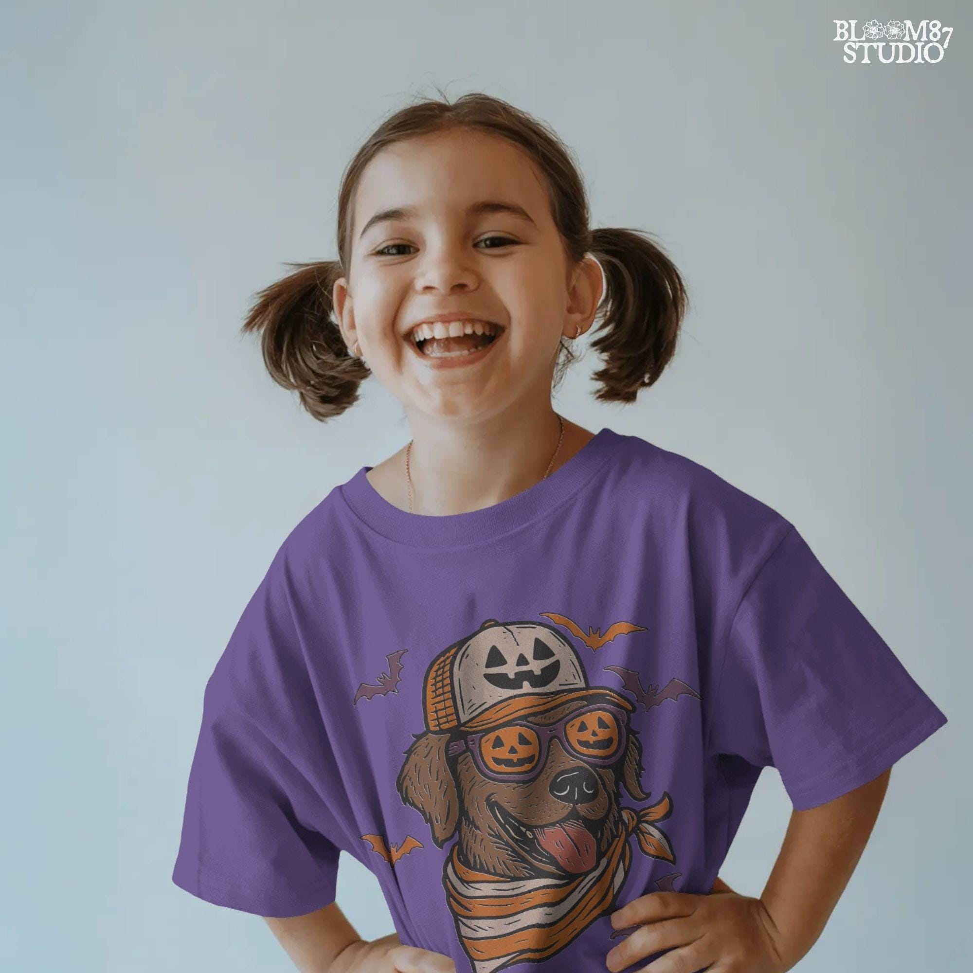 Chocolate labrador wearing pumpkin hat and jack-o’-lantern sunglasses with Halloween bats and orange bandana, Halloween sublimation PNG design