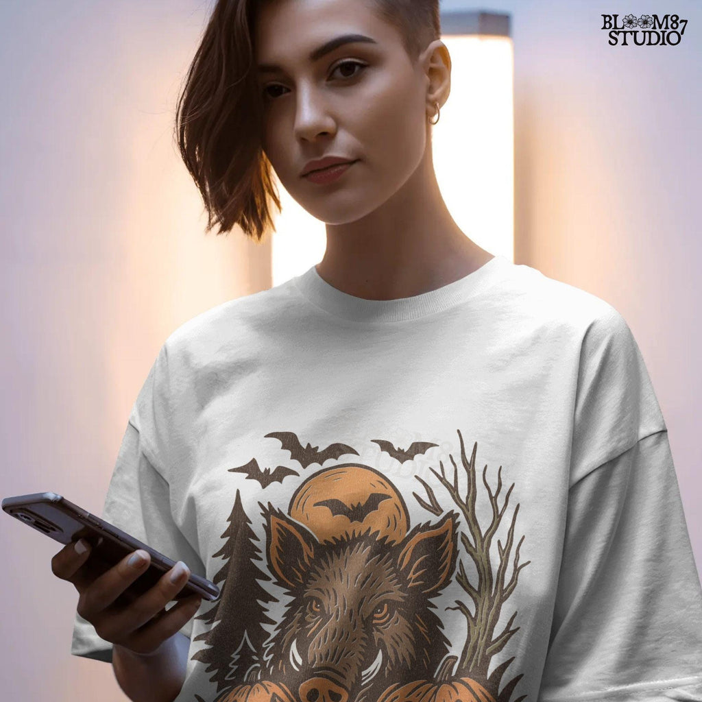 Halloween wild boar sublimation PNG featuring a fierce hog with jack-o’-lantern pumpkins, bats, and spooky forest background in vintage style