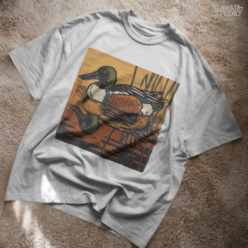 Illustration of a Northern Shoveler duck swimming in a marsh pond at sunset with warm orange and brown reflections, digital PNG for sublimation crafts
