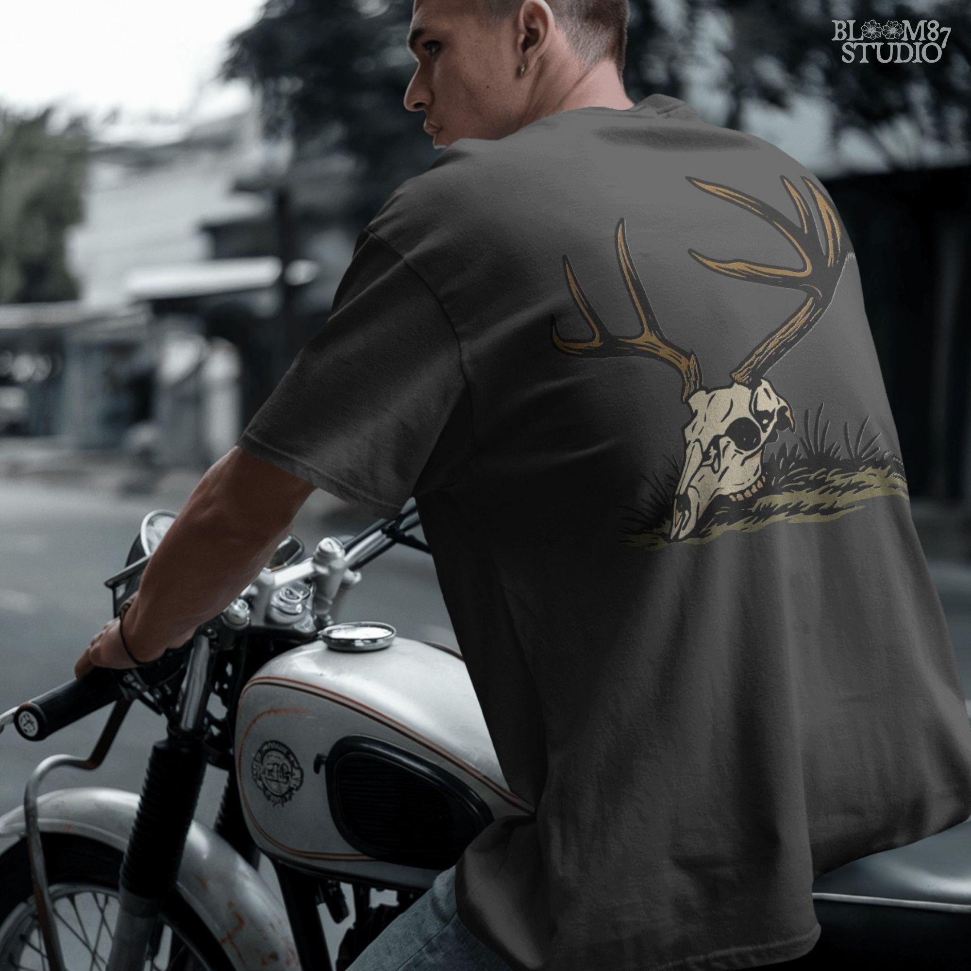 Rustic illustration of a deer skull with large antlers lying on grass, PNG design for hunting-themed and western-style sublimation crafts