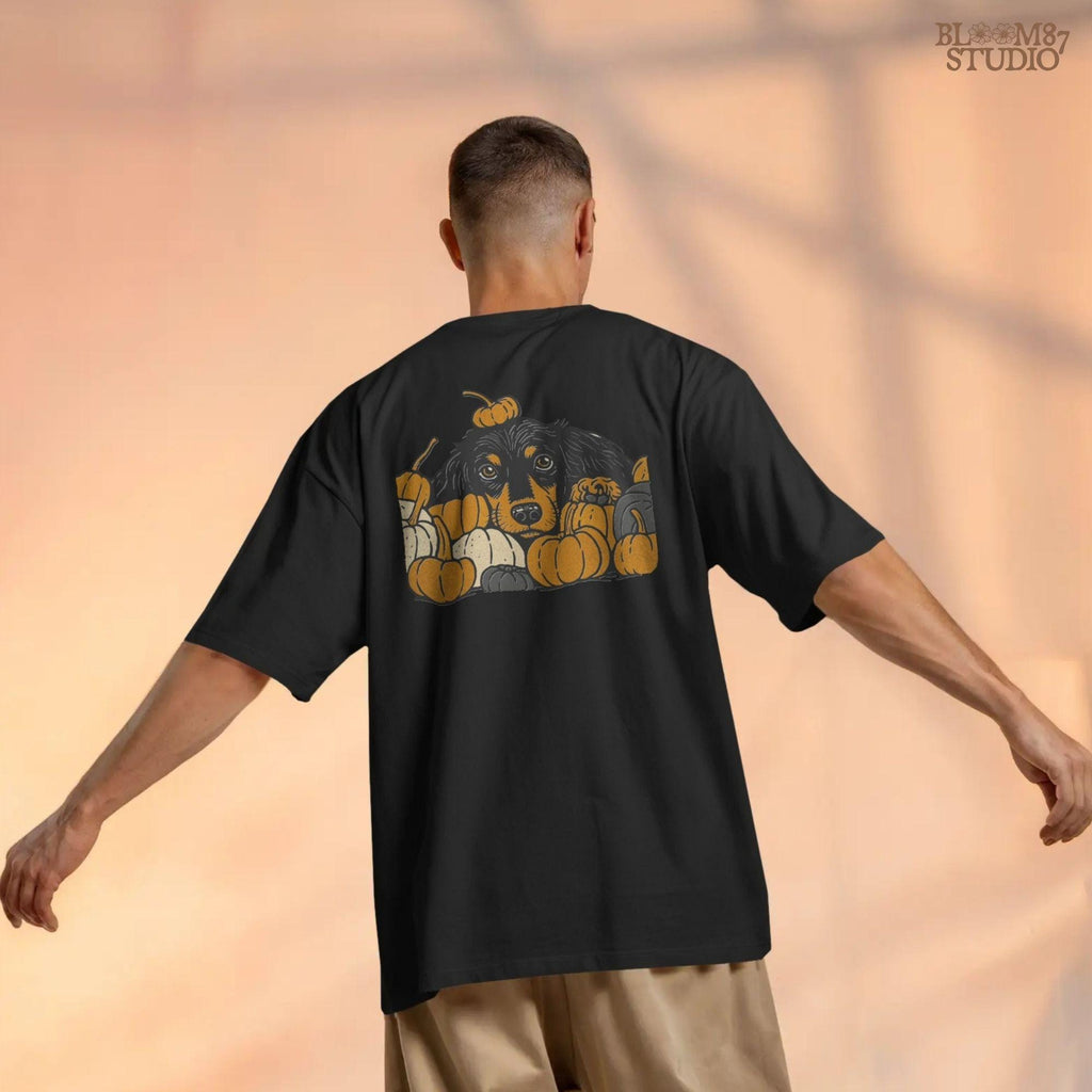 Long-haired dachshund surrounded by fall pumpkins in orange, cream, and gray tones, perfect for autumn sublimation designs and shirts