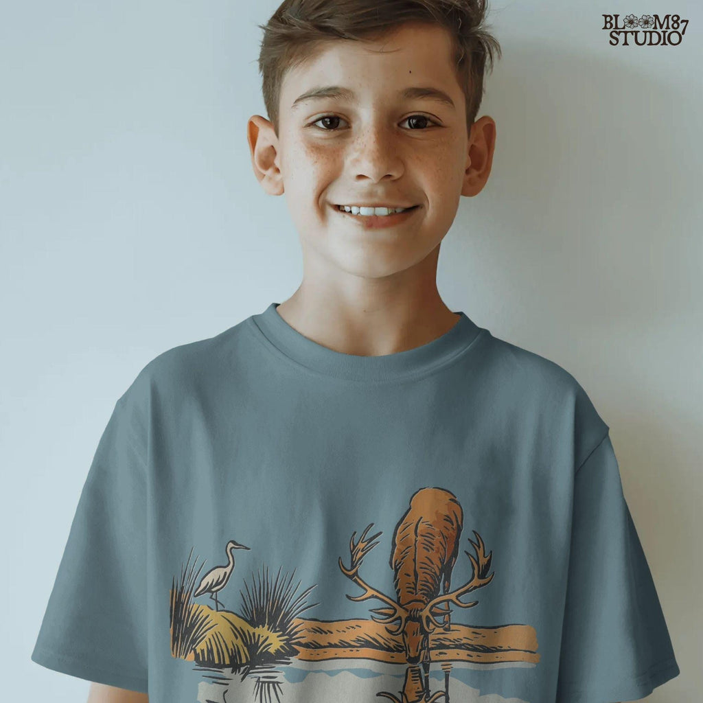 Rustic illustration of a deer with large antlers drinking from a lake, reflected in the water, with a heron in the background, PNG for sublimation crafts