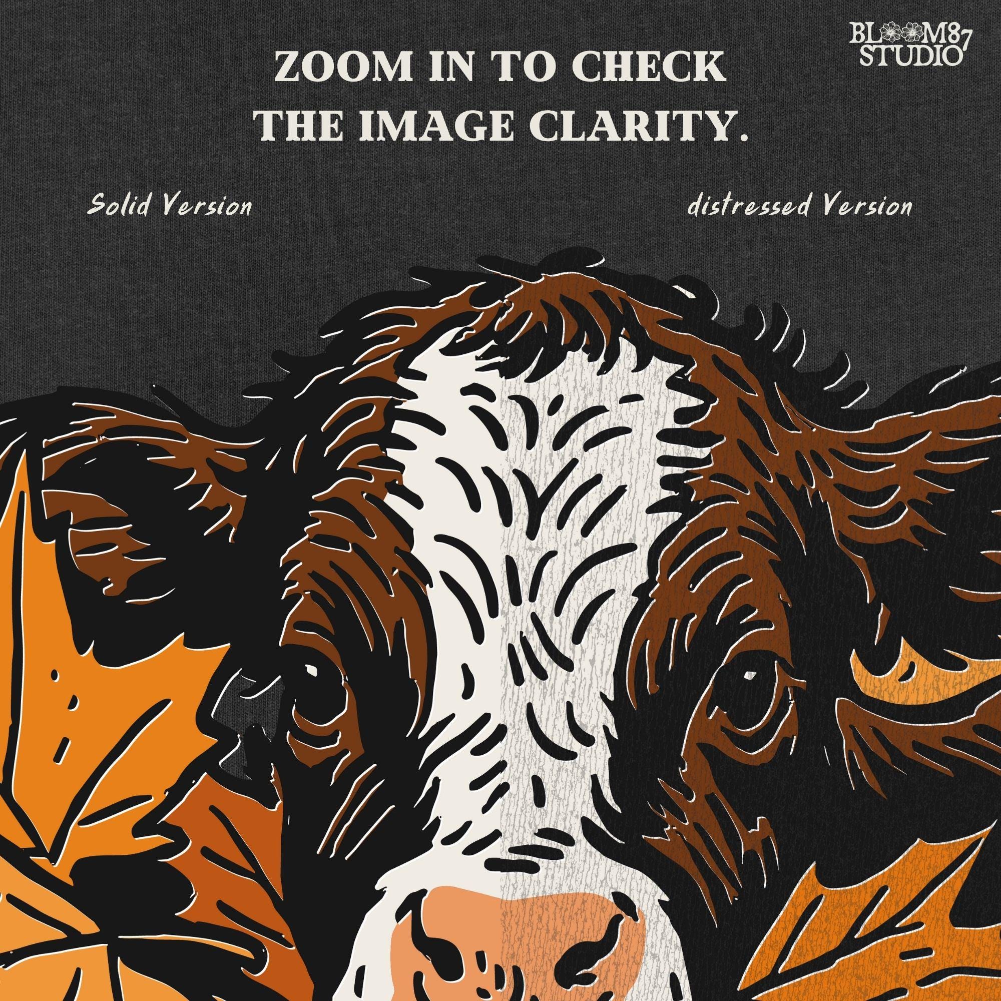 Cute brown and white highland calf resting in a pile of orange and brown fall maple leaves, perfect for autumn sublimation projects