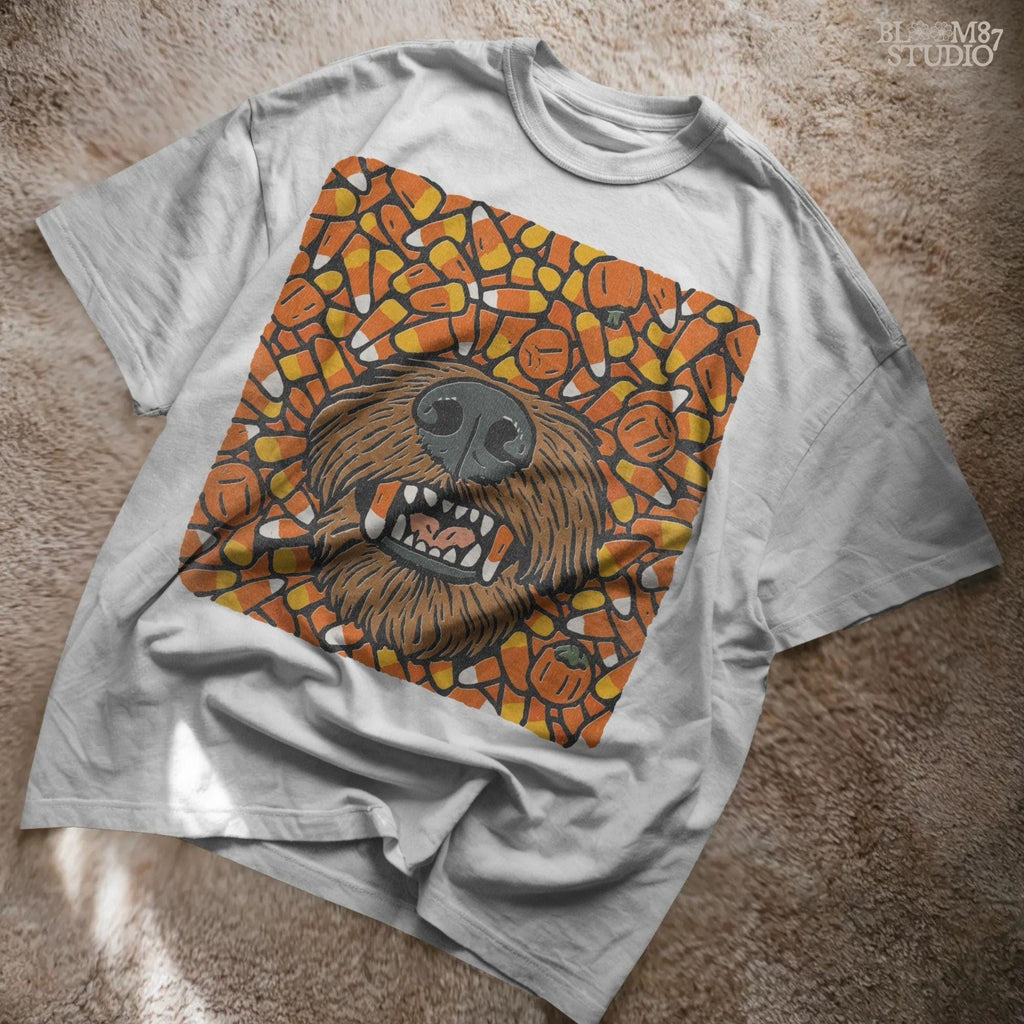 Funny werewolf-style dog face surrounded by candy corn and pumpkins in a Halloween-themed sublimation design