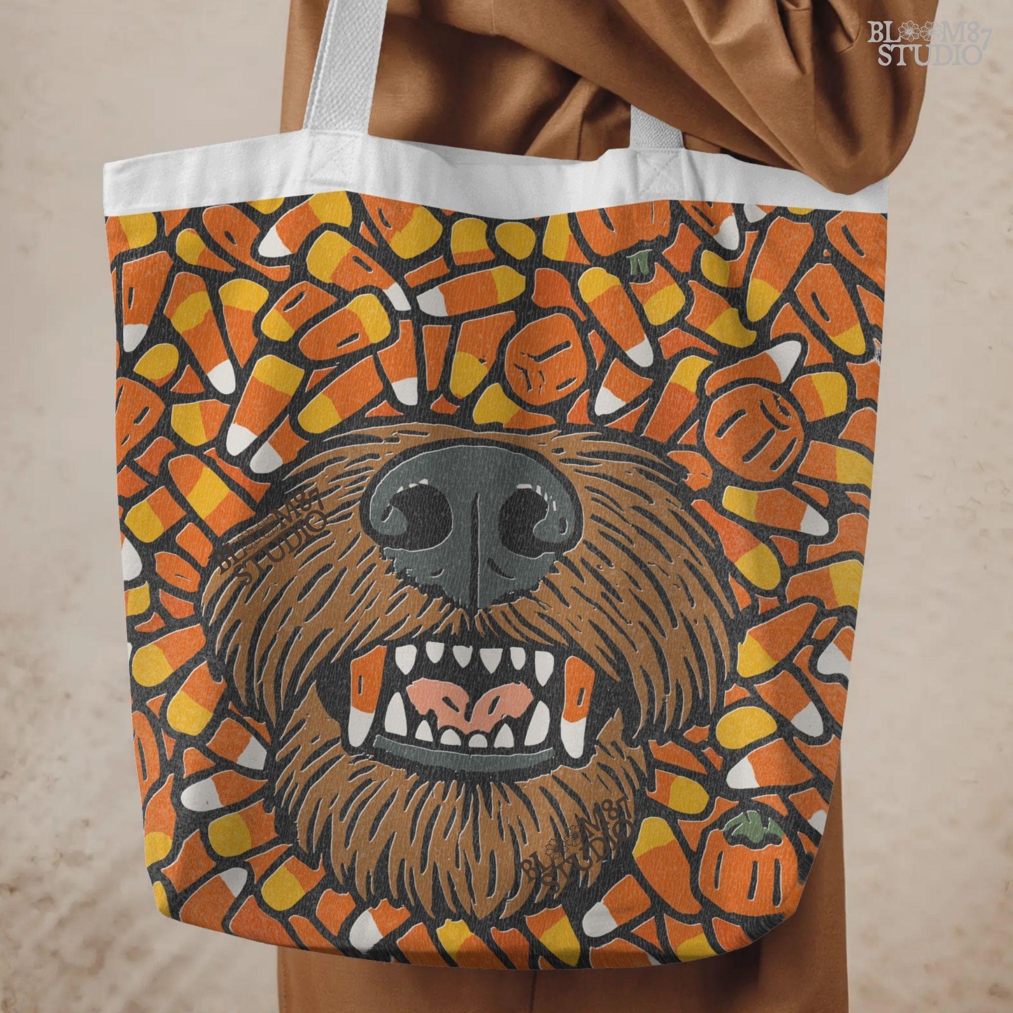 Funny werewolf-style dog face surrounded by candy corn and pumpkins in a Halloween-themed sublimation design