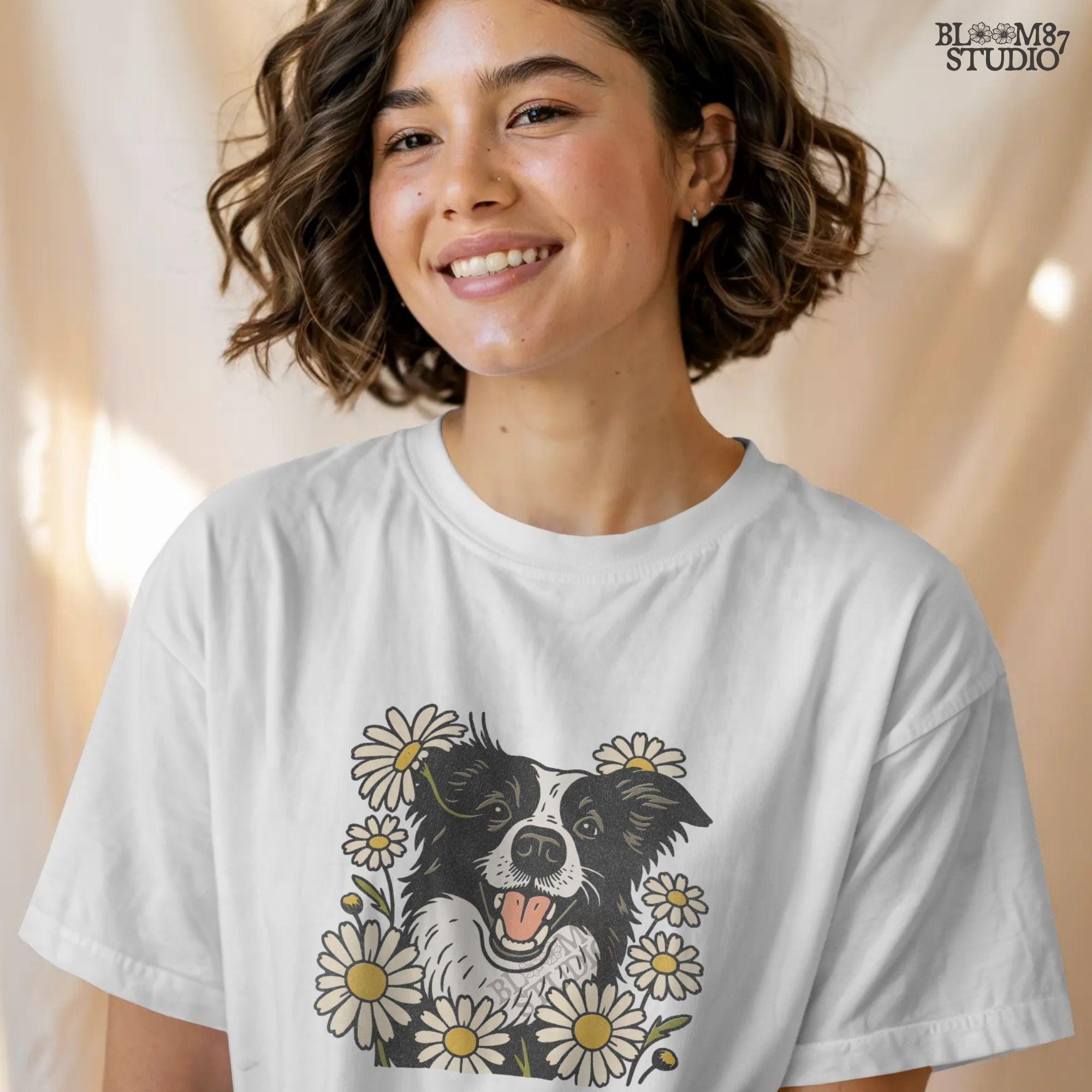 Happy Border Collie dog surrounded by white and yellow daisy flowers in a spring floral sublimation PNG design
