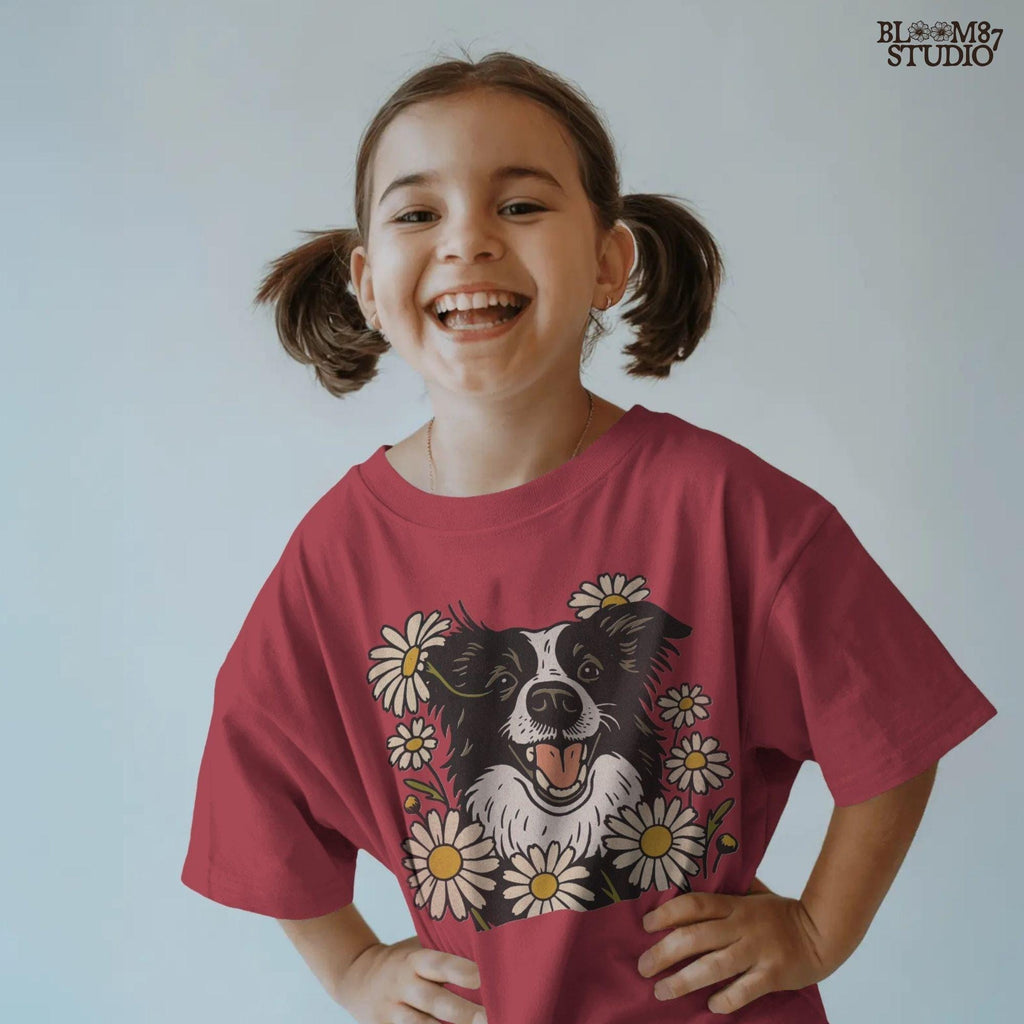 Happy Border Collie dog surrounded by white and yellow daisy flowers in a spring floral sublimation PNG design