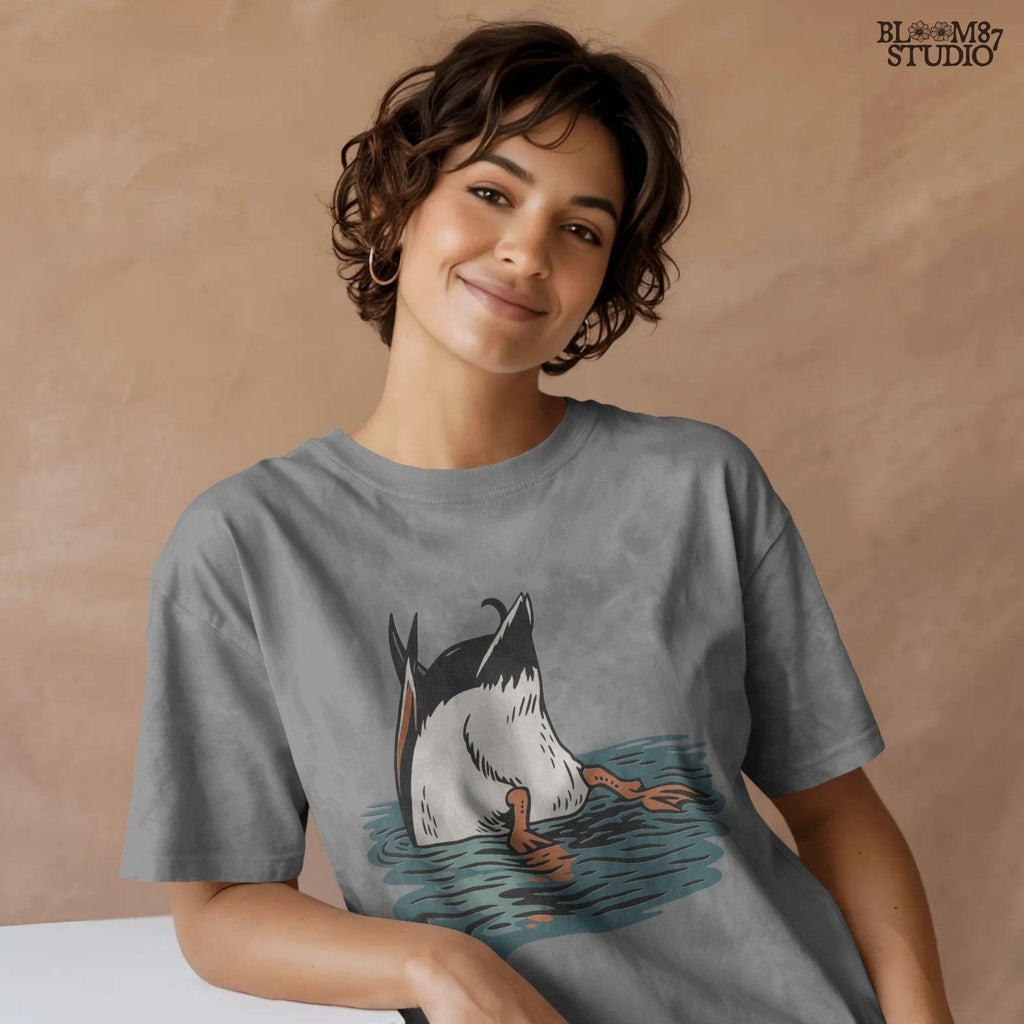 Humorous illustration of a duck diving underwater with only its tail and orange webbed feet visible, perfect PNG for hunting and lodge décor designs