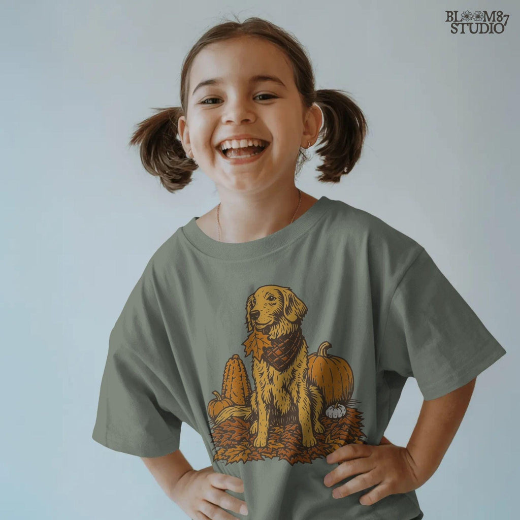 Illustration of a golden retriever dog with a scarf sitting among pumpkins, corn, and autumn leaves, perfect for fall sublimation and Thanksgiving décor designs