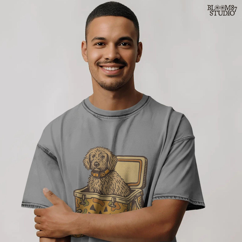 Cute golden doodle dog sitting in a Halloween camo cooler with jack-o’-lantern face, fall-themed sublimation graphic on transparent background.