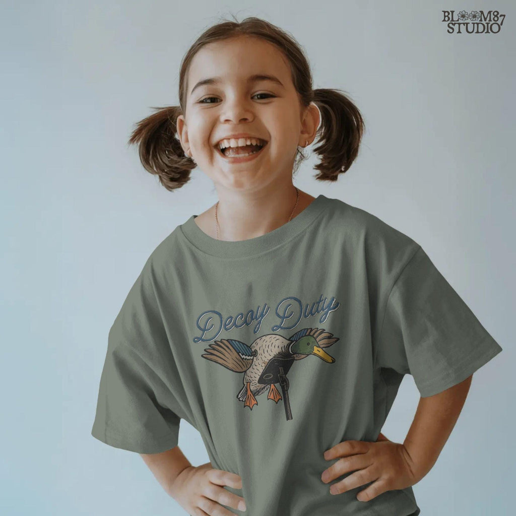 Illustration of a mallard duck hunting decoy with the words “Decoy Duty,” rustic sublimation PNG design for hunters and outdoor artwork.