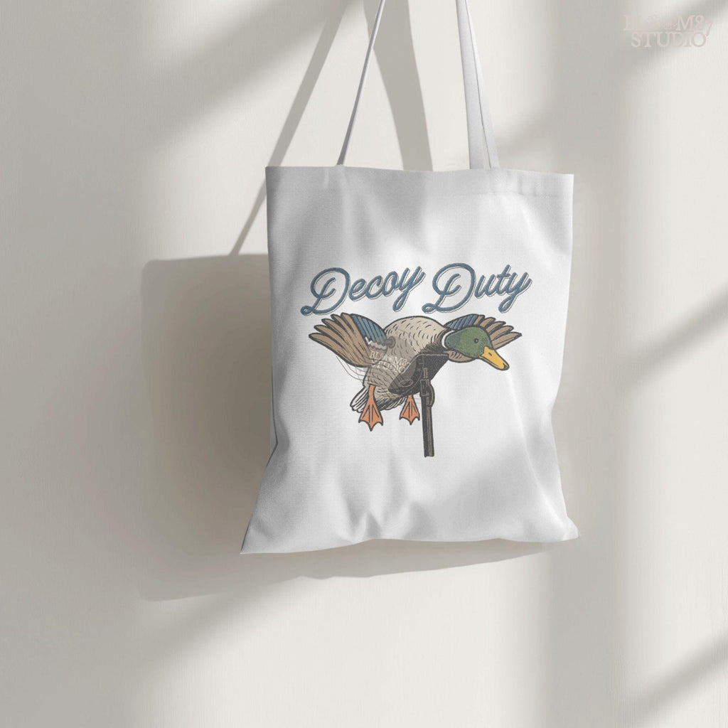 Illustration of a mallard duck hunting decoy with the words “Decoy Duty,” rustic sublimation PNG design for hunters and outdoor artwork.