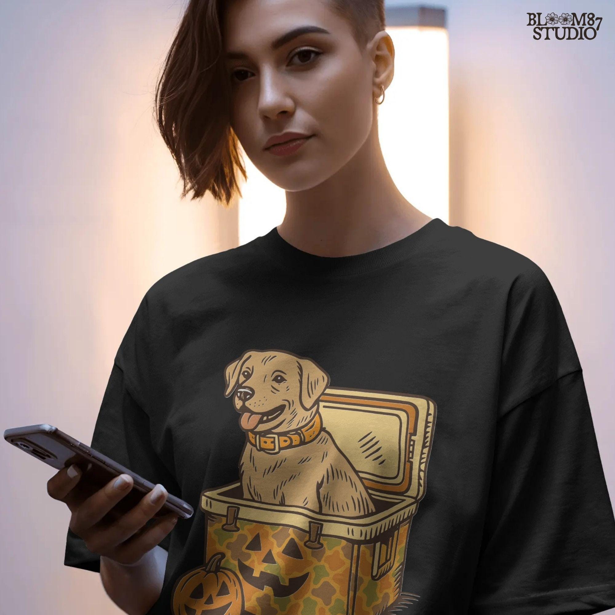 Halloween-themed yellow Labrador retriever sitting inside a pumpkin camo cooler with jack-o’-lanterns, sublimation PNG graphic.