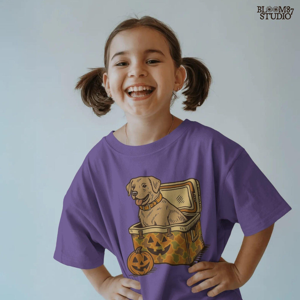 Halloween-themed yellow Labrador retriever sitting inside a pumpkin camo cooler with jack-o’-lanterns, sublimation PNG graphic.