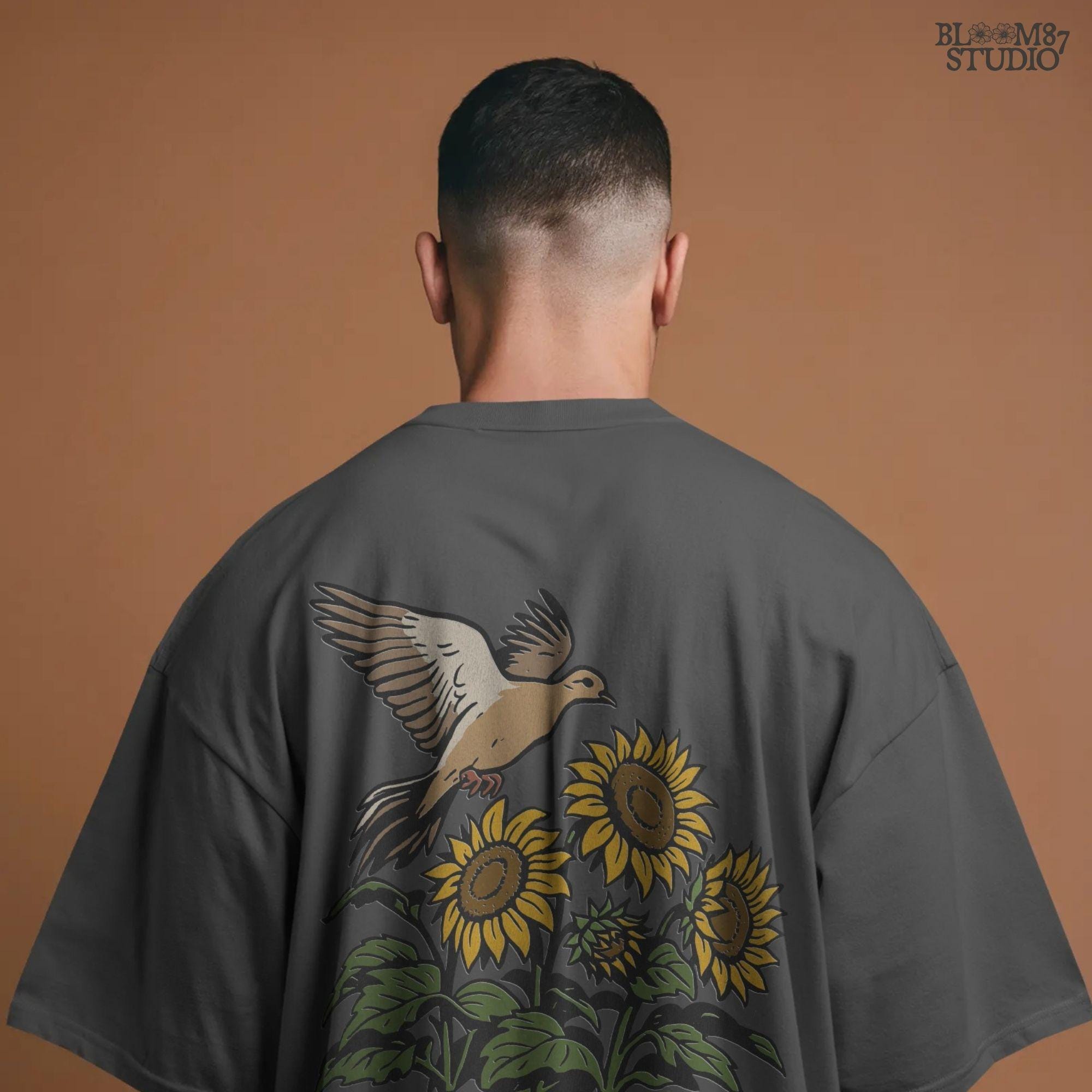 Mourning dove flying above blooming sunflowers with green leaves. Rustic sublimation PNG design for fall and country-themed crafts.