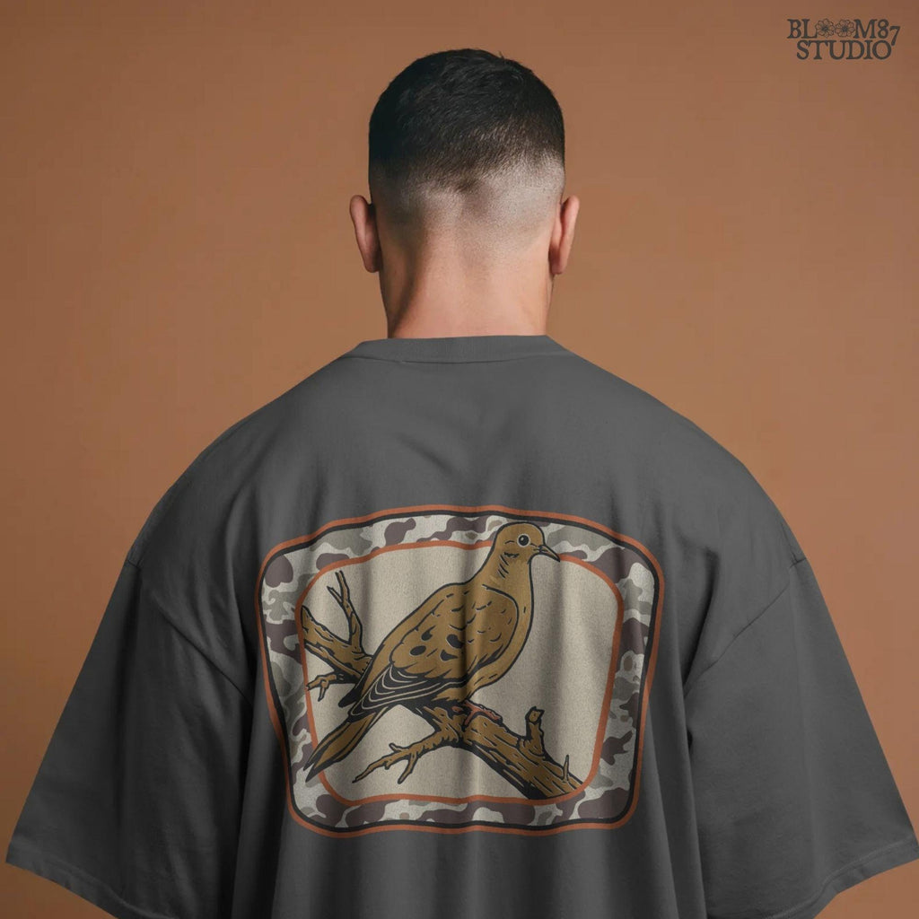 Rustic illustration of a mourning dove perched on a branch with camo border, ideal for hunting season and southern fall sublimation crafts.