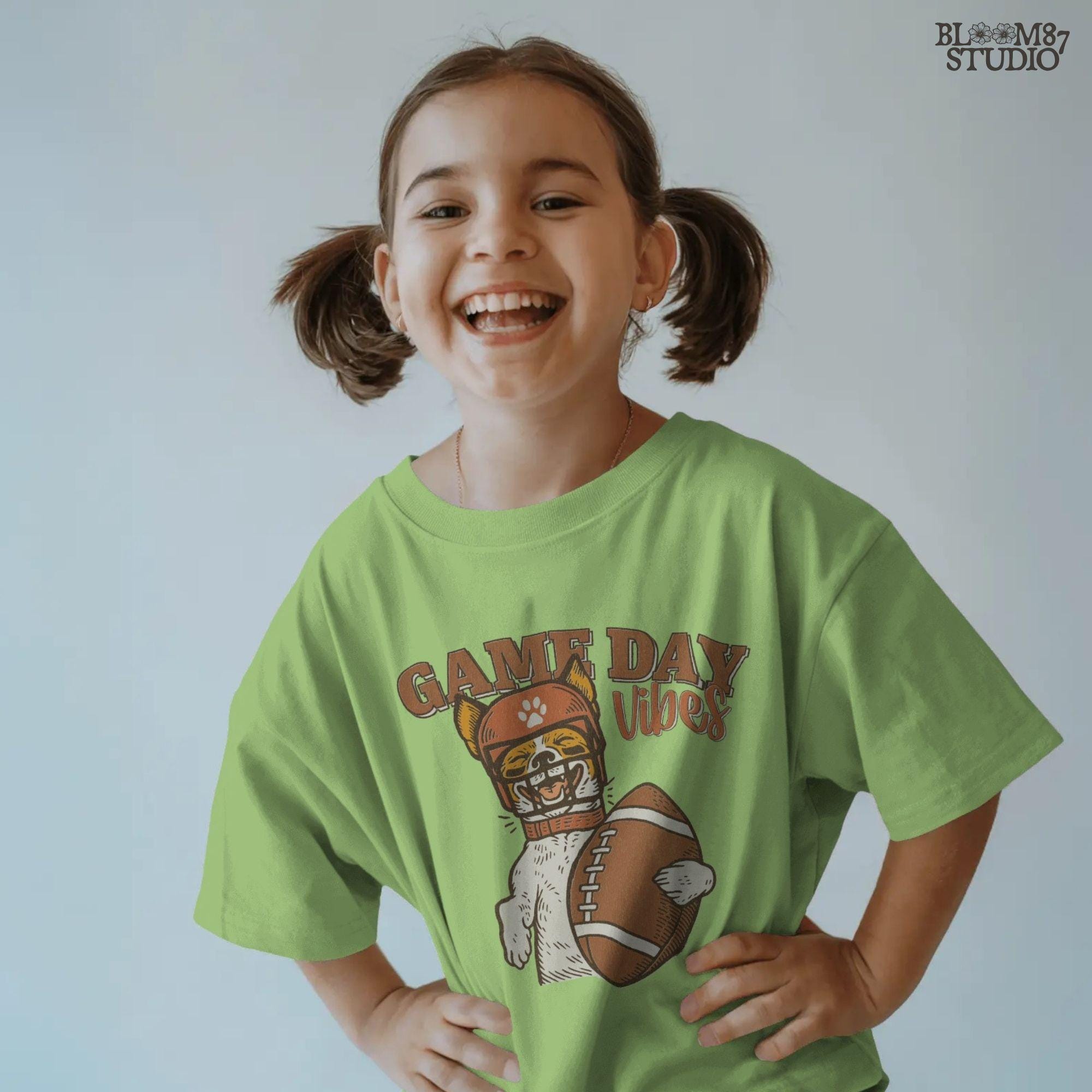 Cartoon Jack Russell Terrier wearing a football helmet holding a ball with the text “Game Day Vibes” – sublimation PNG for sports fans and pet lovers