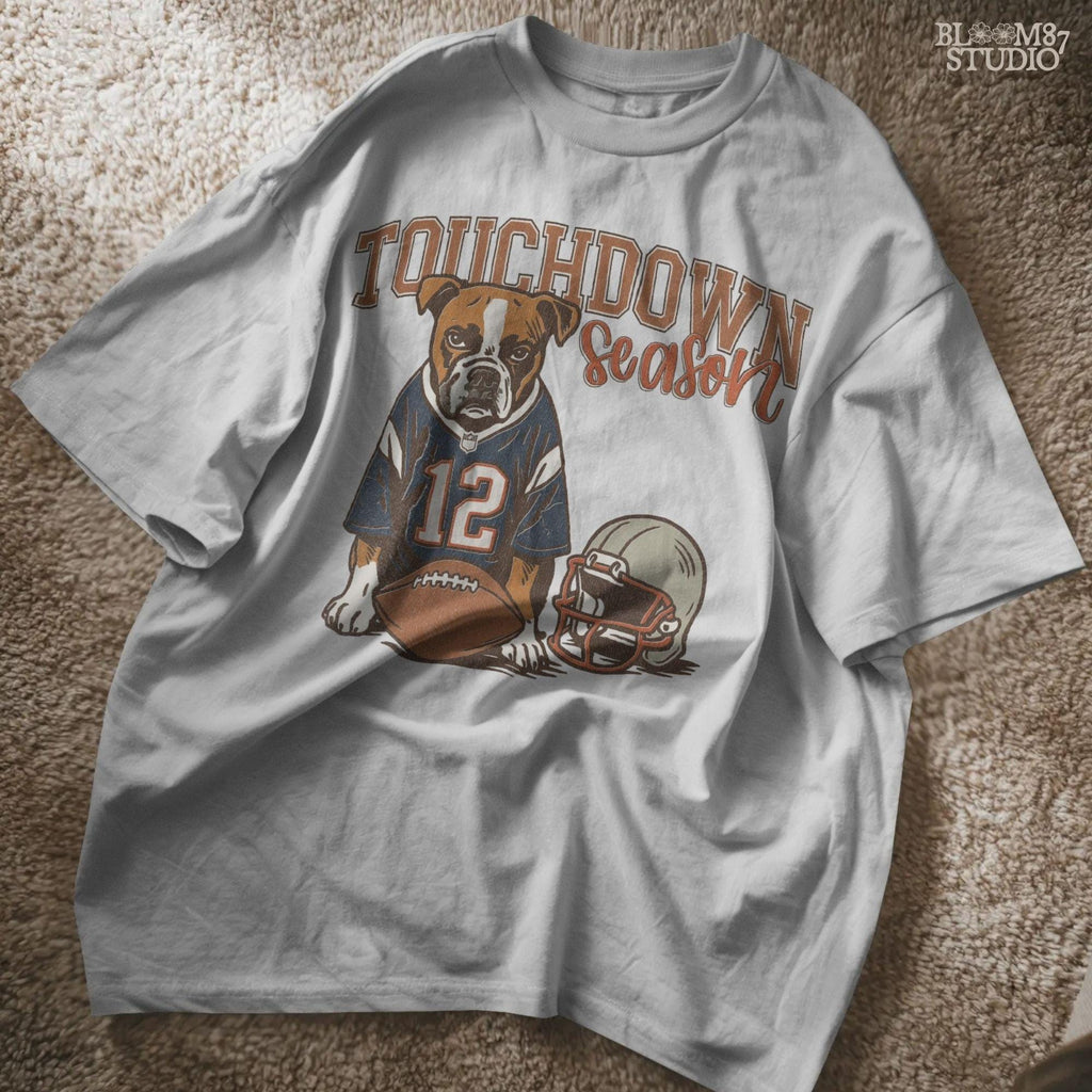 Illustration of a bulldog wearing a football jersey with helmet and ball, text “Touchdown Season” – sublimation PNG for sports fans and dog lovers