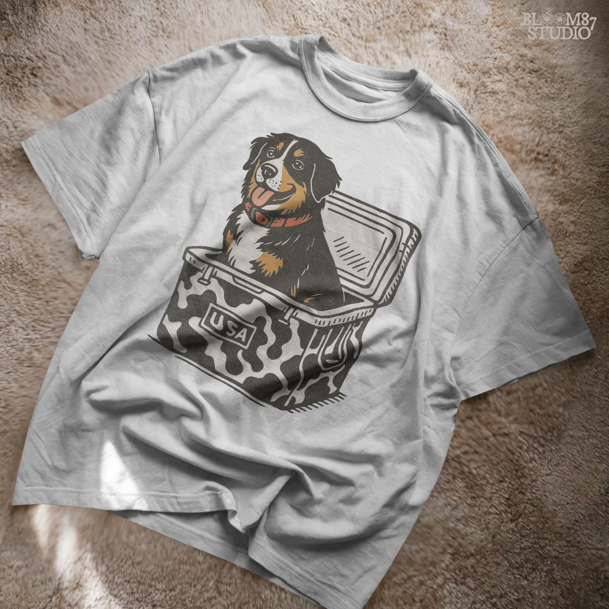 Bernese Mountain Dog sitting in a USA camo cooler, sublimation PNG design for hunting, camping, tailgate, and outdoor lifestyle projects.