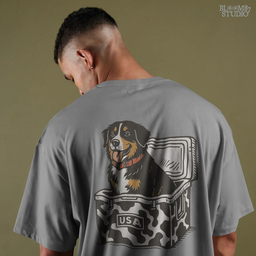 Bernese Mountain Dog sitting in a USA camo cooler, sublimation PNG design for hunting, camping, tailgate, and outdoor lifestyle projects.